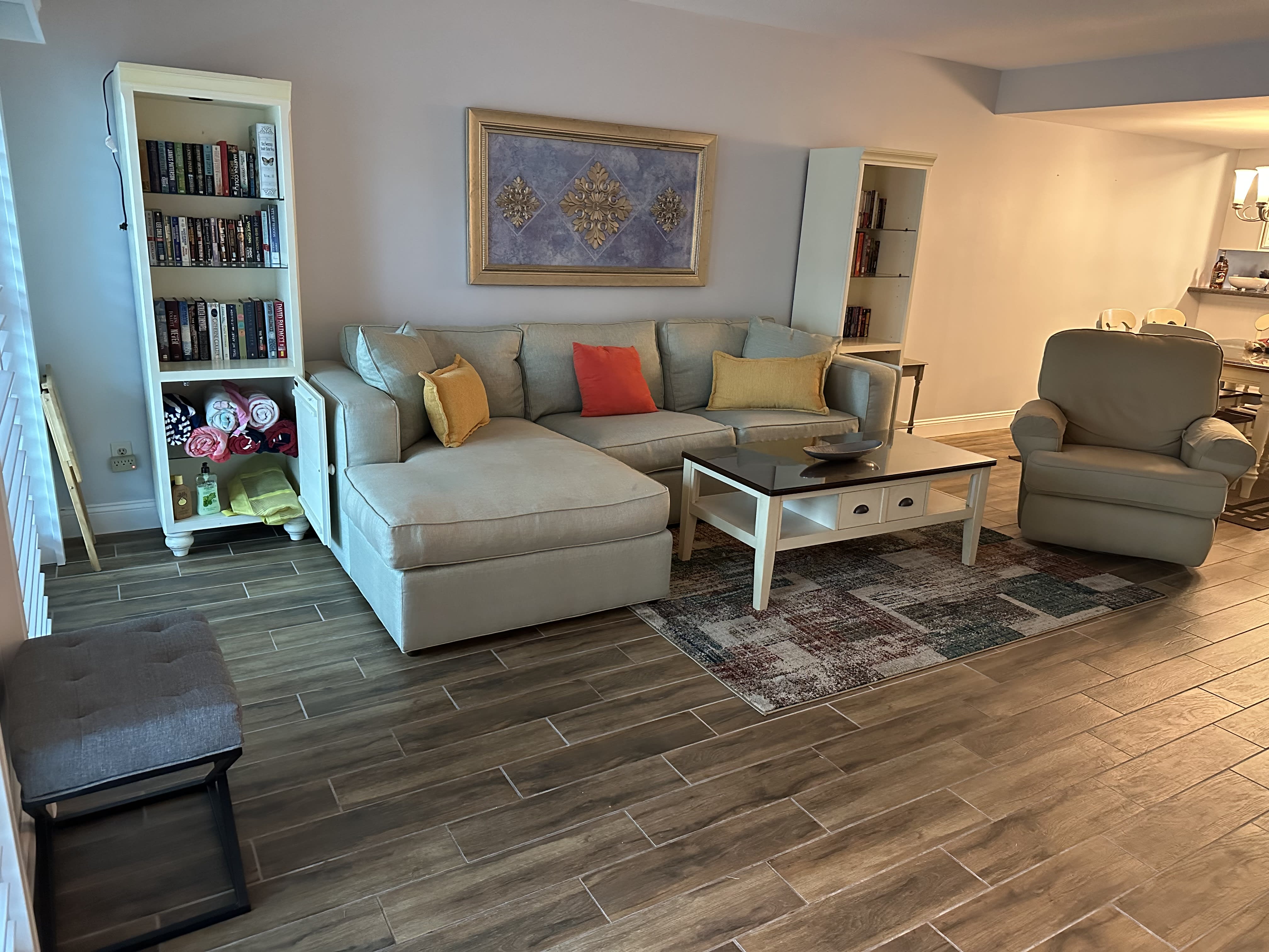 Living Room with lots and lots of books to read &amp; beach towels to use