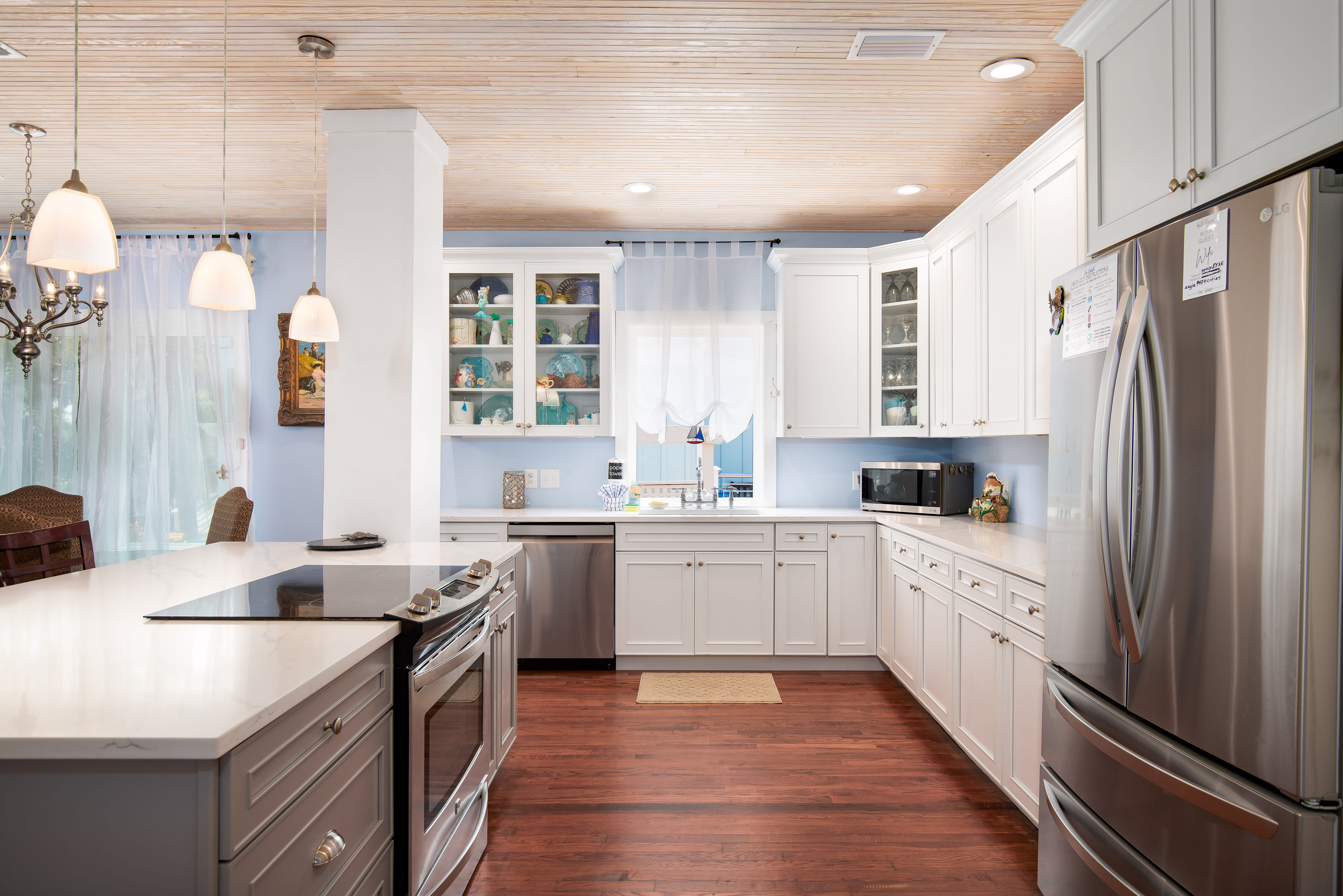 Beautiful new kitchen with new stainless steel appliances and countertops.