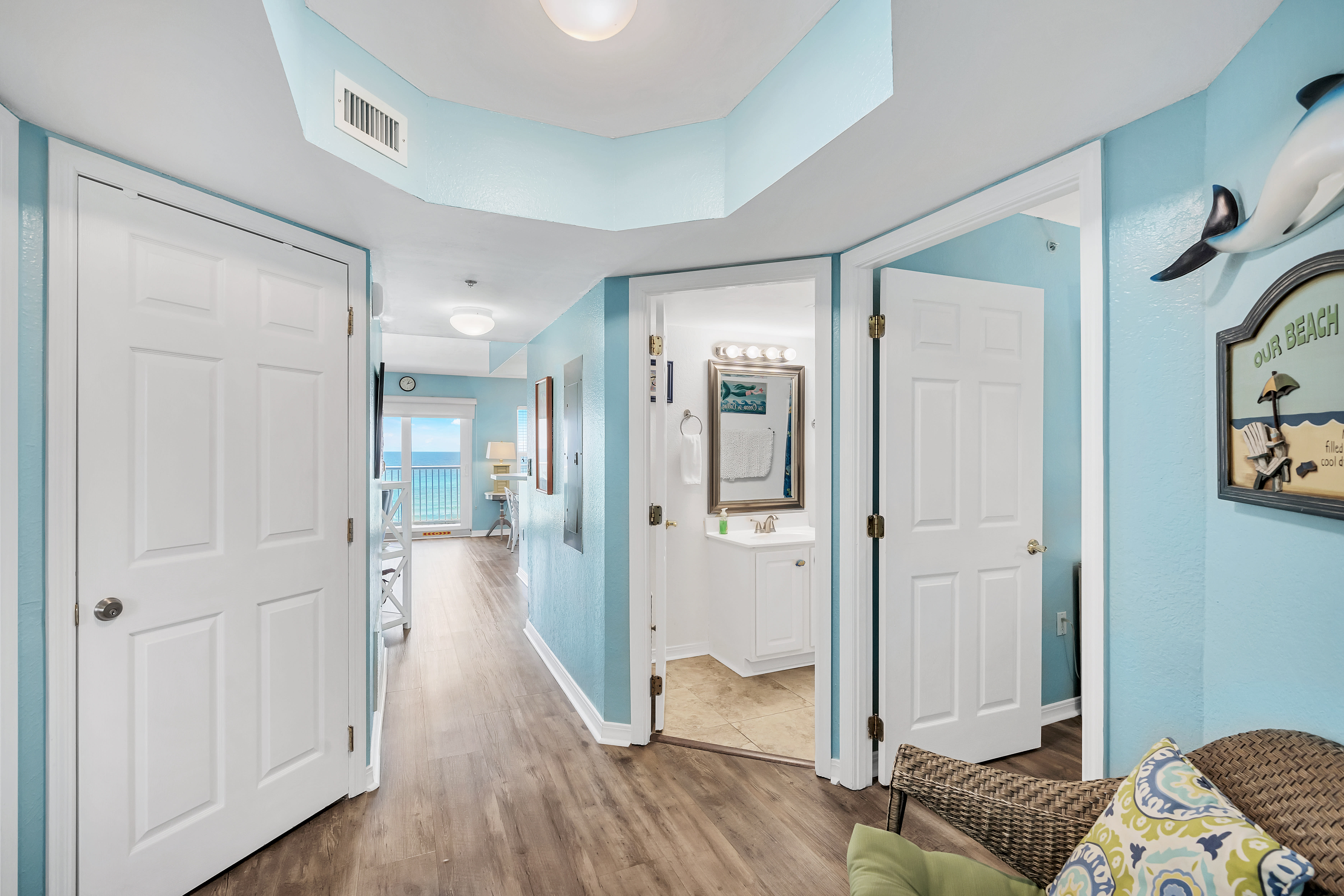 View of the Entrance Hall with doors to the second bedroom and bathroom.