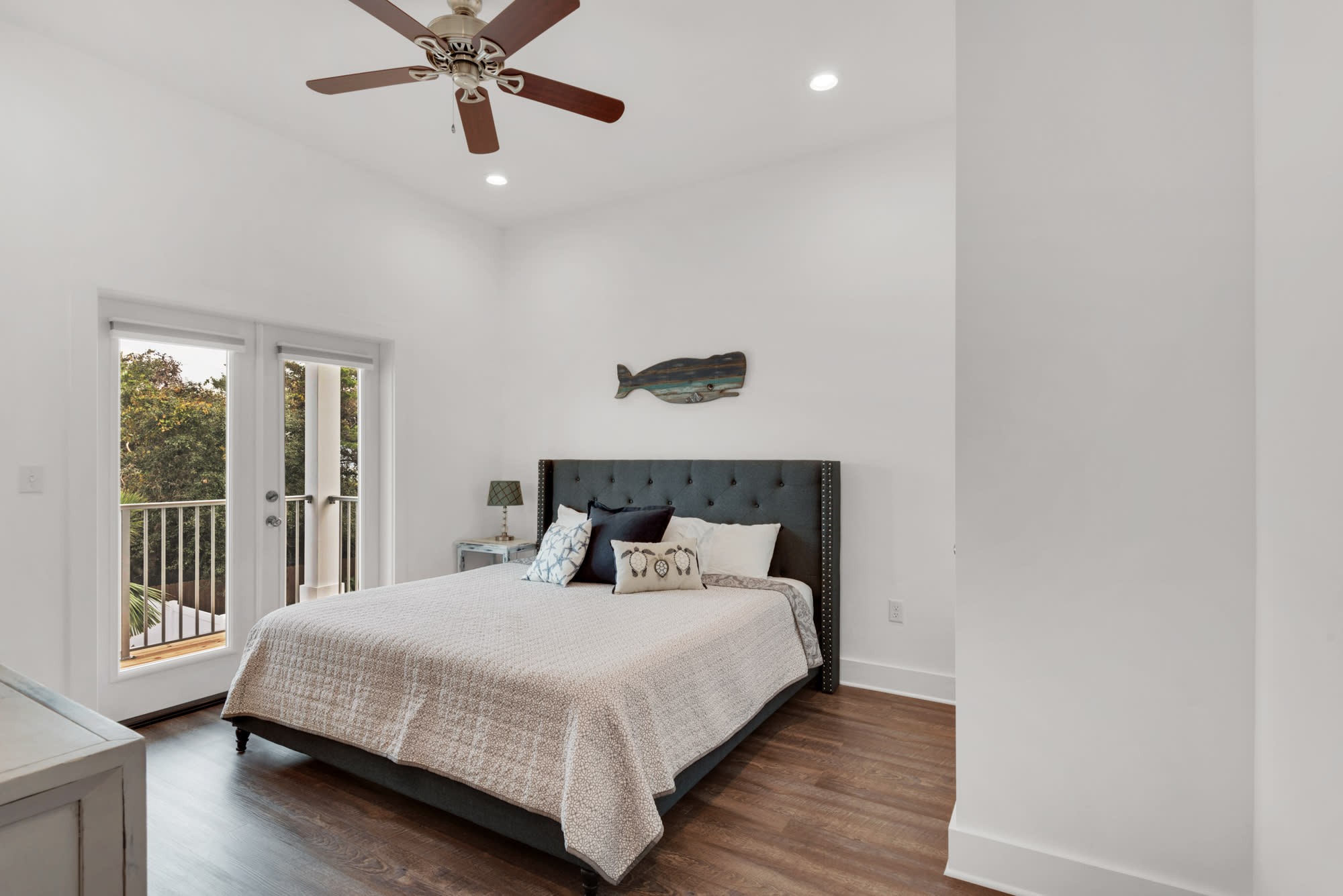 King Bedroom with private bathroom and access to deck overlooking the pool