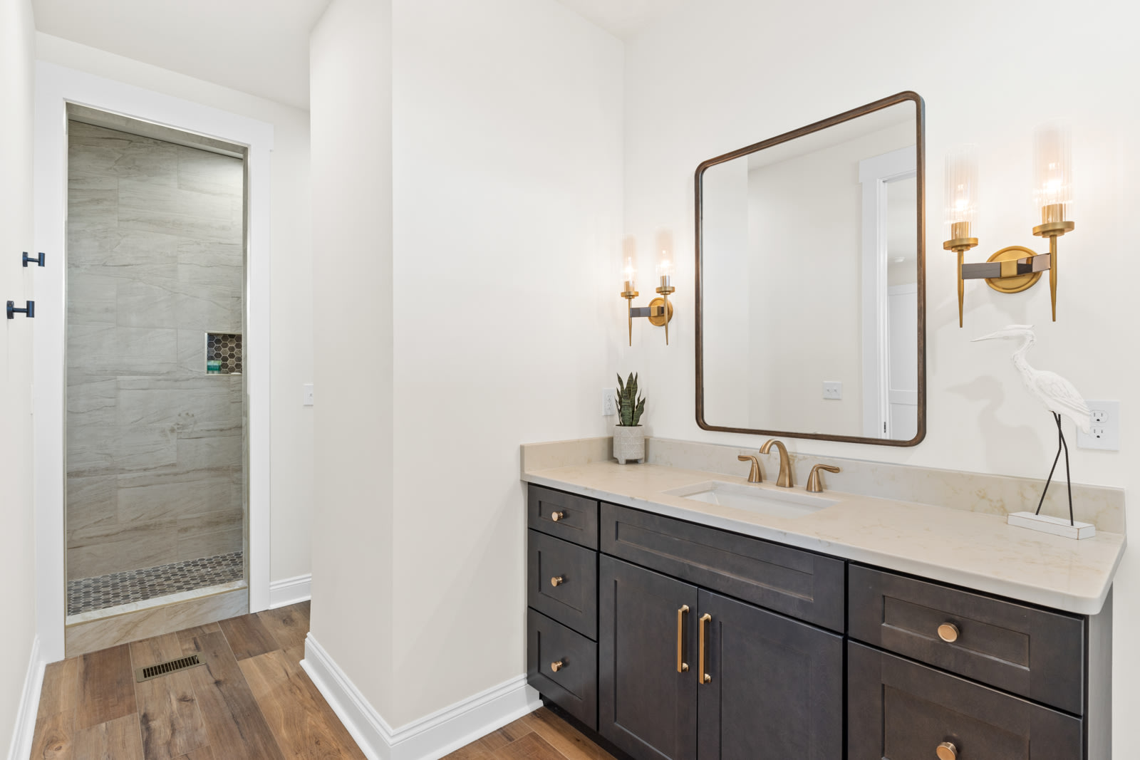 Rear Master En Suite Bathroom with a Peek into the Large Tiled Shower Rear Master En Suite Bathroom with a Peek into the Large Tiled Shower