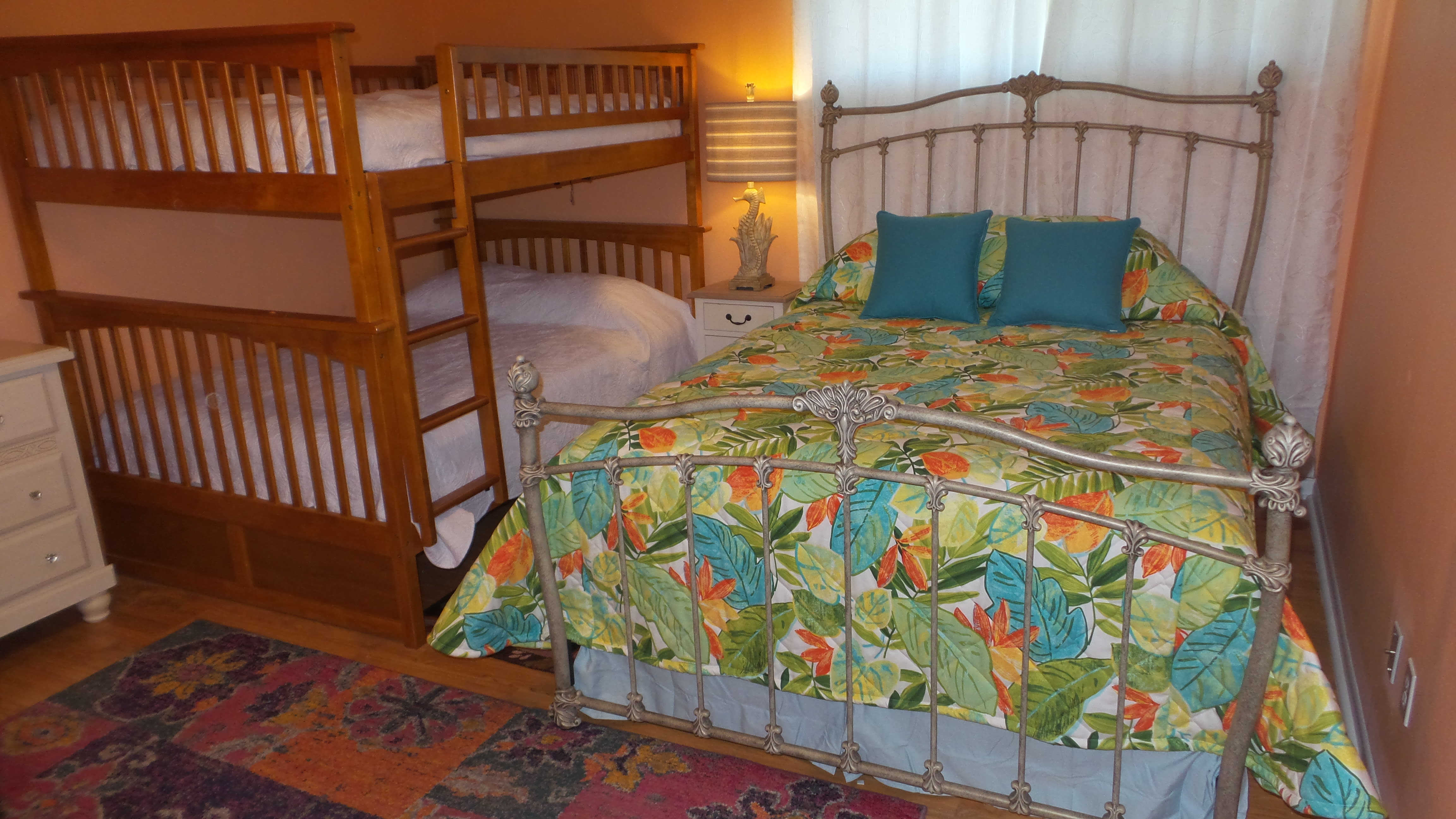 Third Bedroom having a Queen Bed and a Set of Full-over-Full Bunk Beds