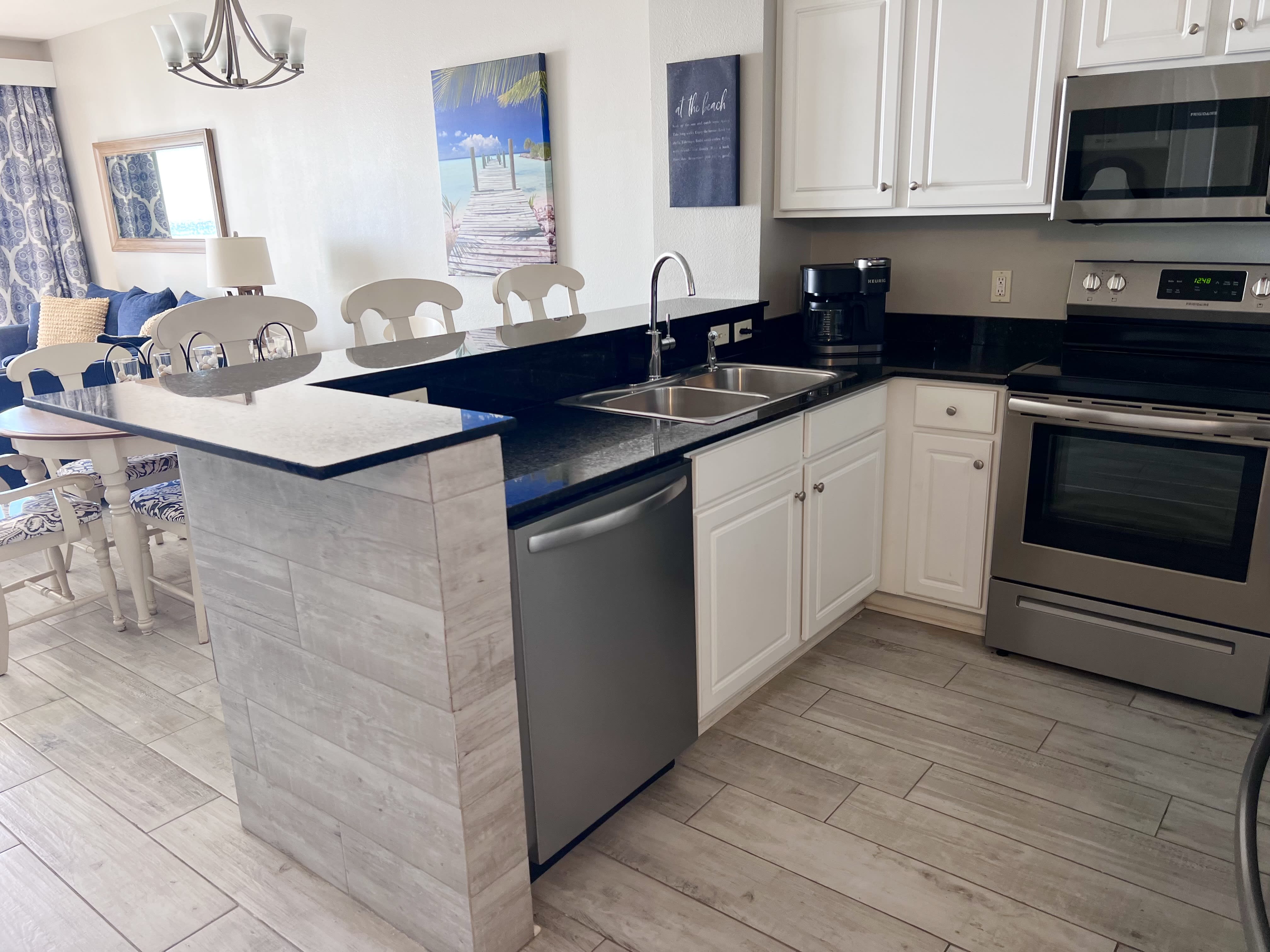 Stainless steel appliances and fully stocked kitchen for easy meals!