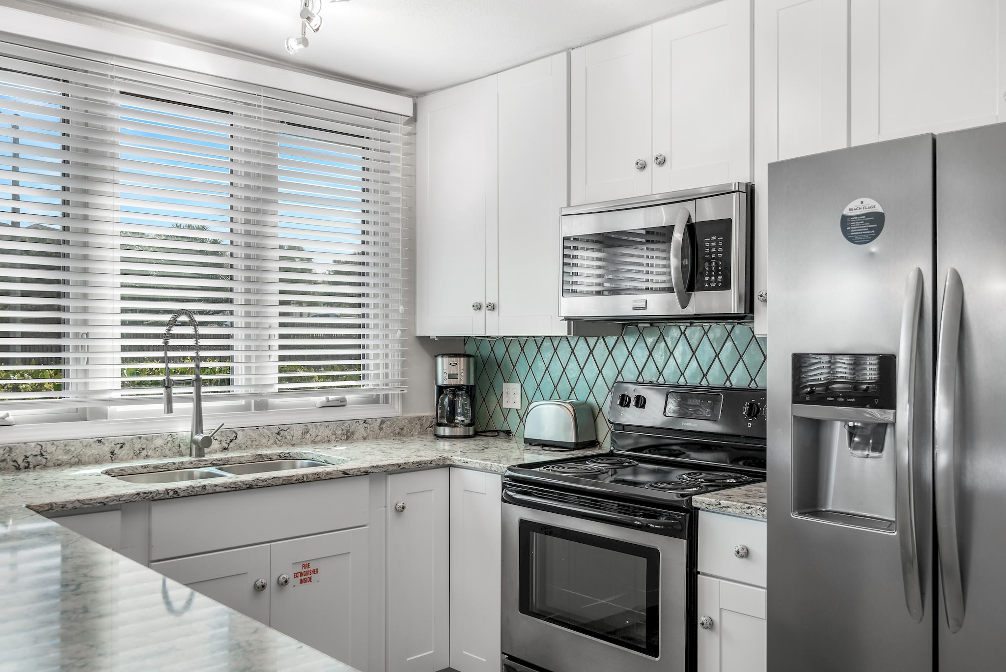 Fully equipped kitchen has all new stainless appliances