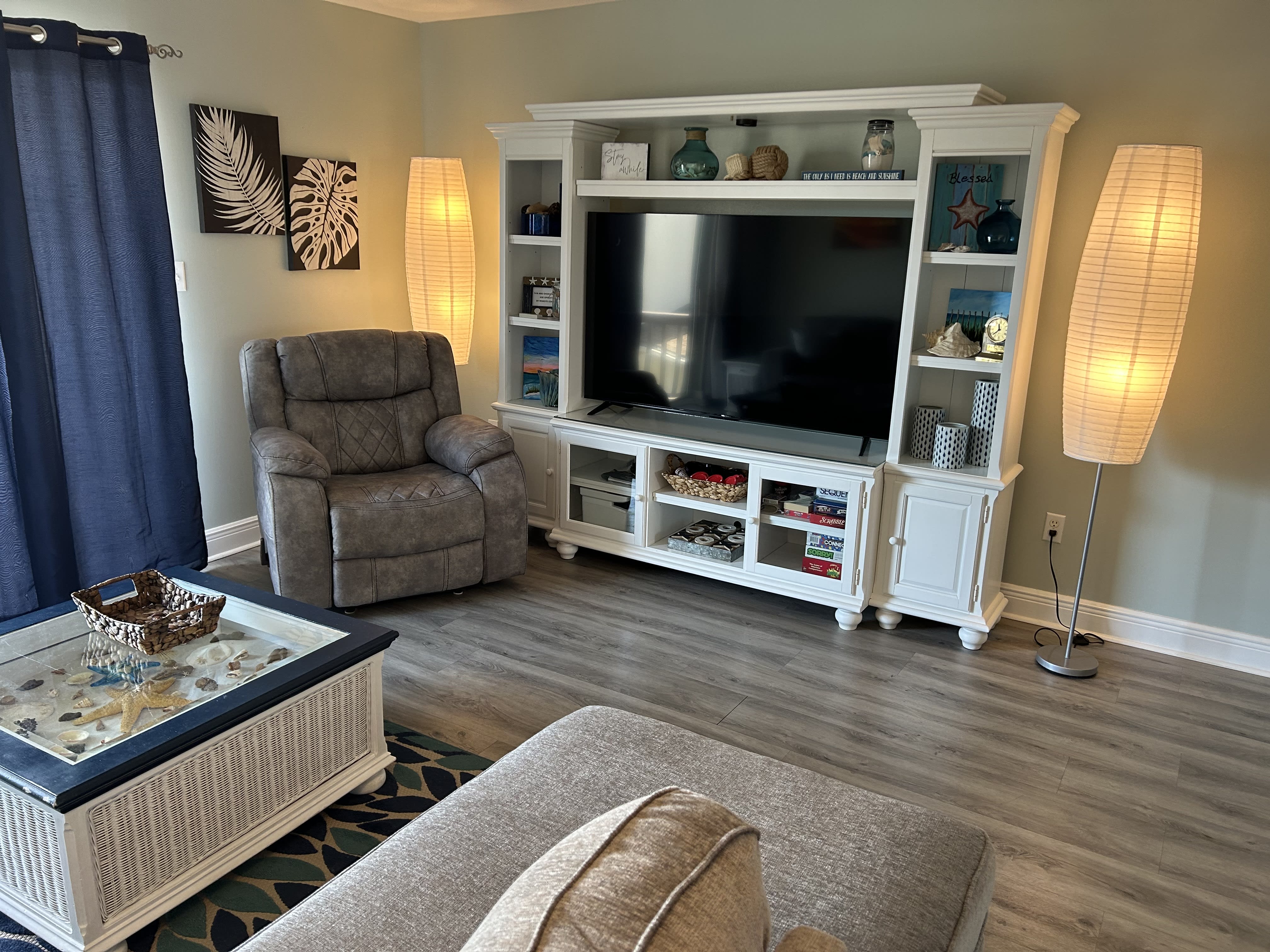 Super new comfortable recliner and  new  65" Smart TV ready for relaxing!