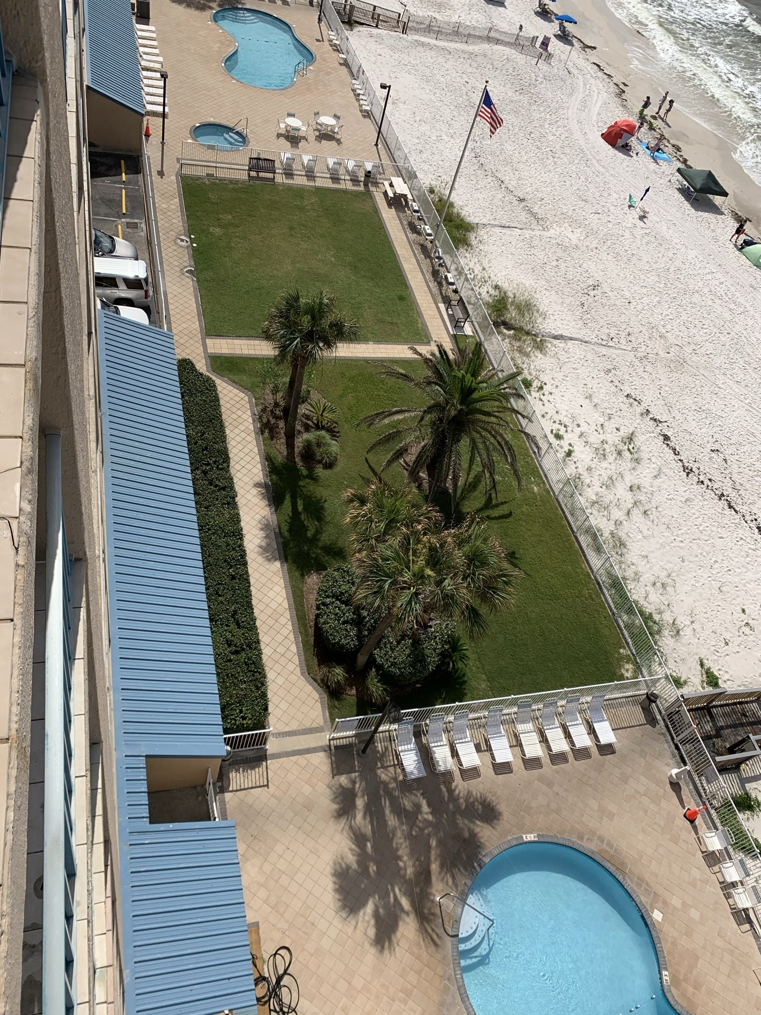 View of both pools and courtyard area