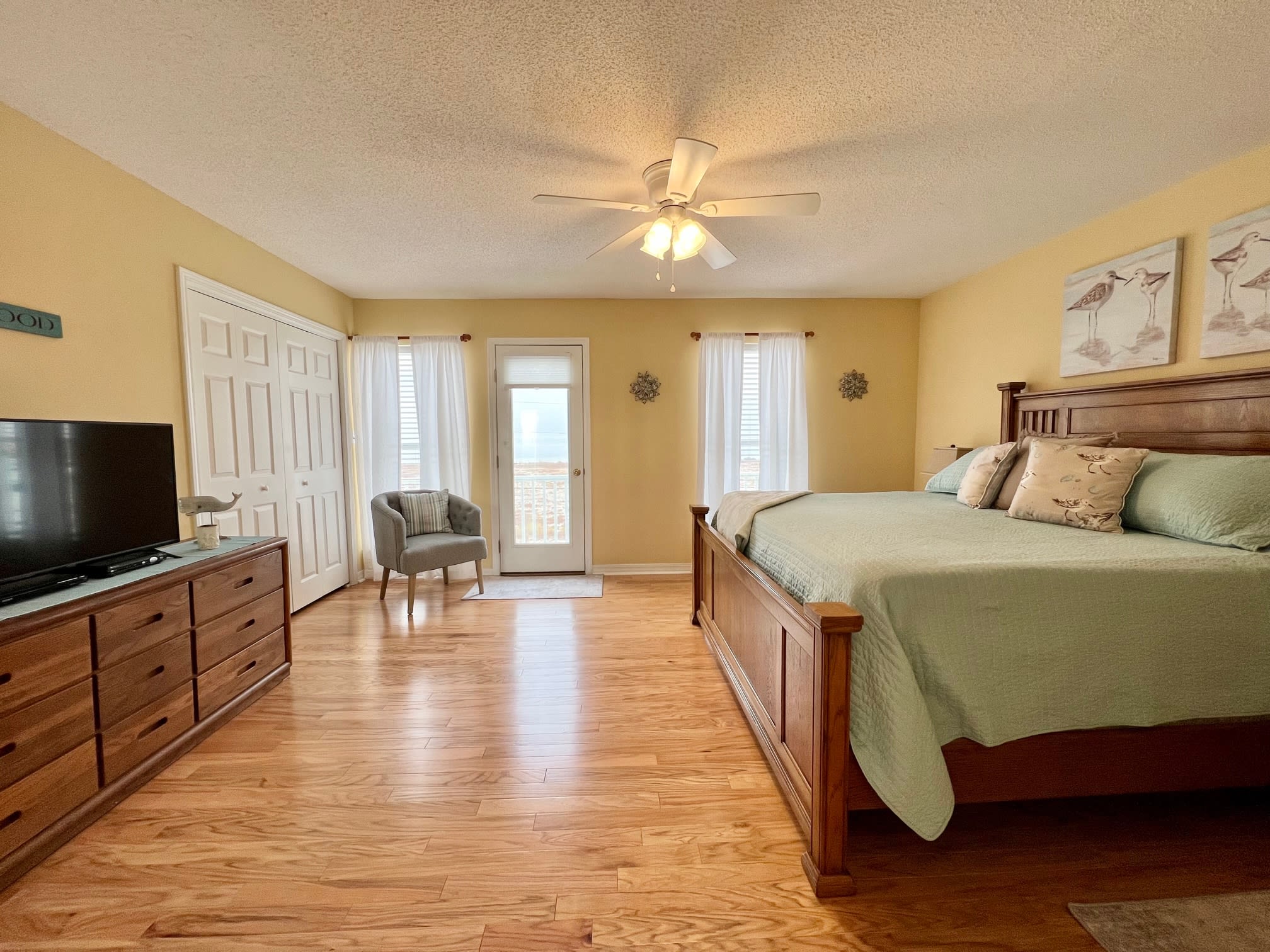 The primary suite offers a king bed, private bath and look-out deck.