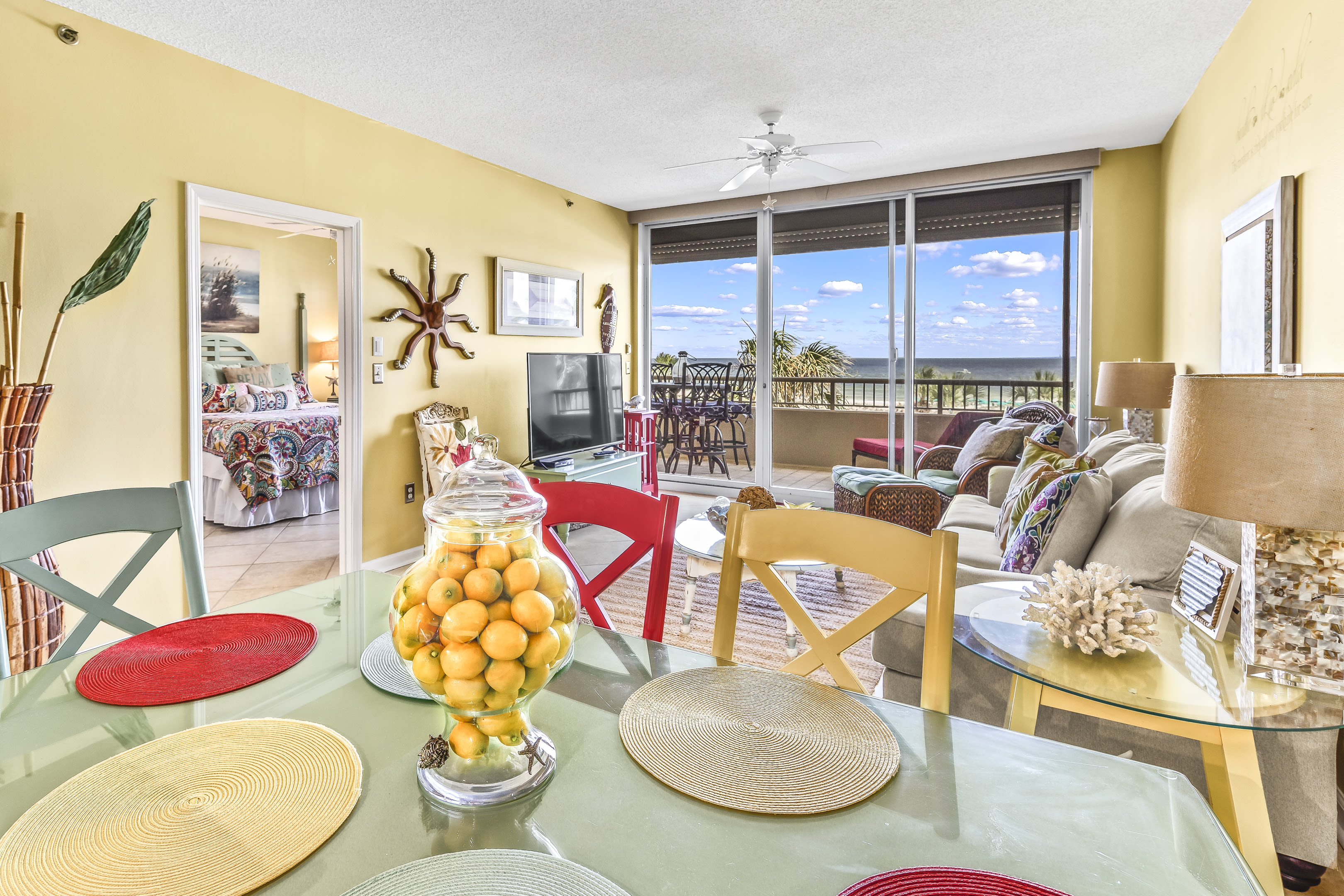 Table with seating for 6 and additional seating at the bar for 4