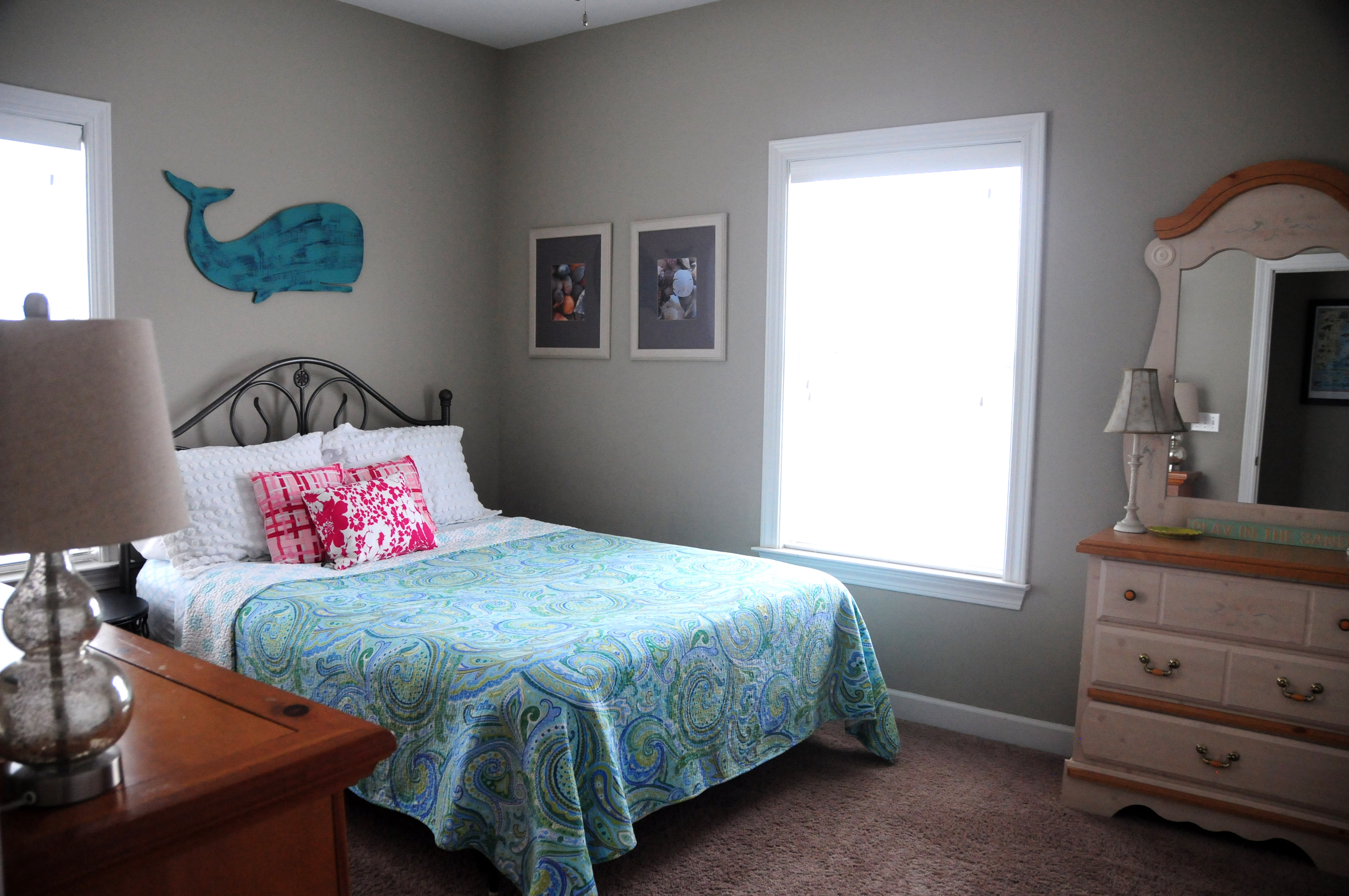 First floor bedroom with a queen size bed