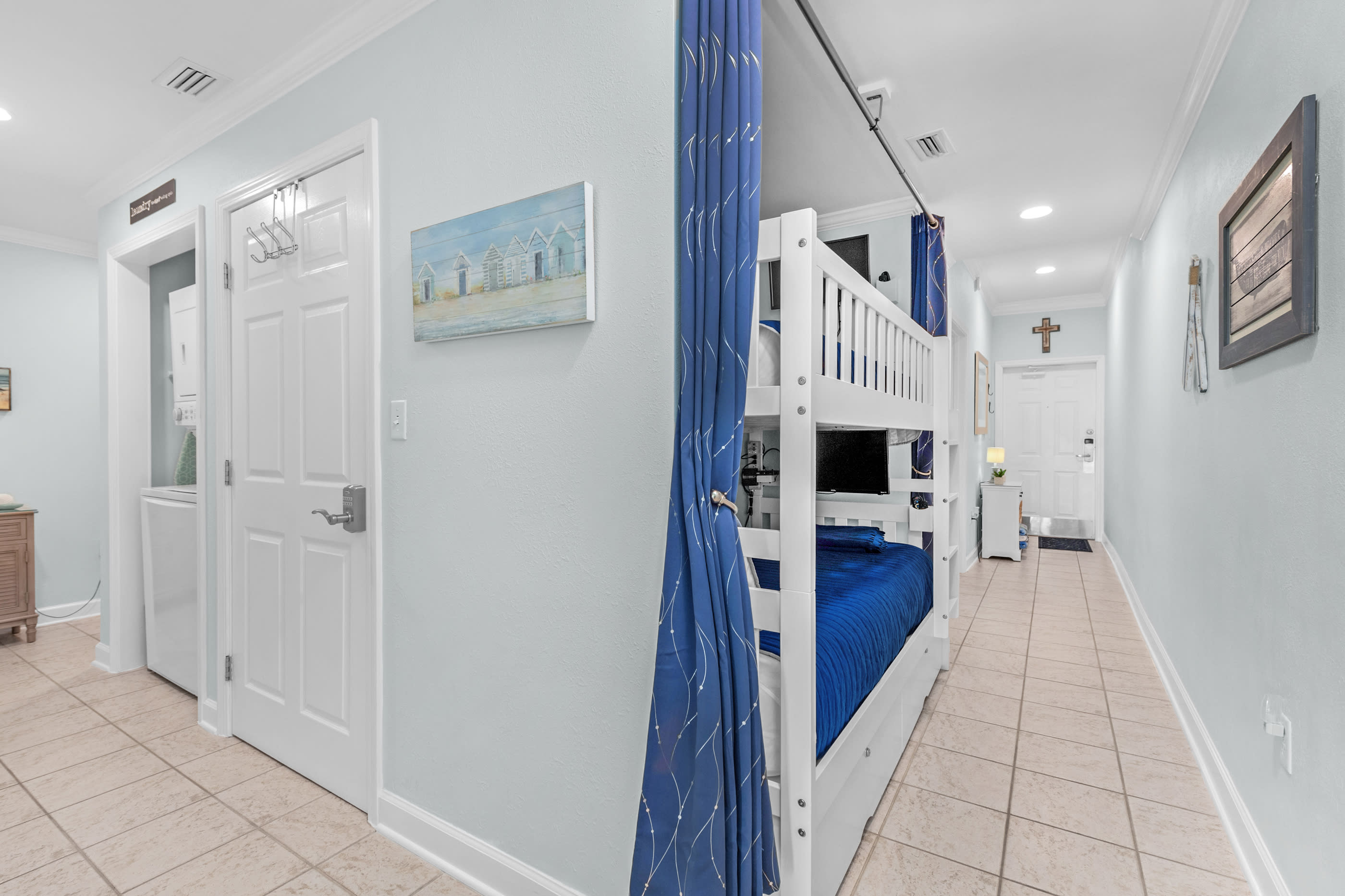 Bunk area each with Smart TVs. The younger guest love the light darkening curtains.