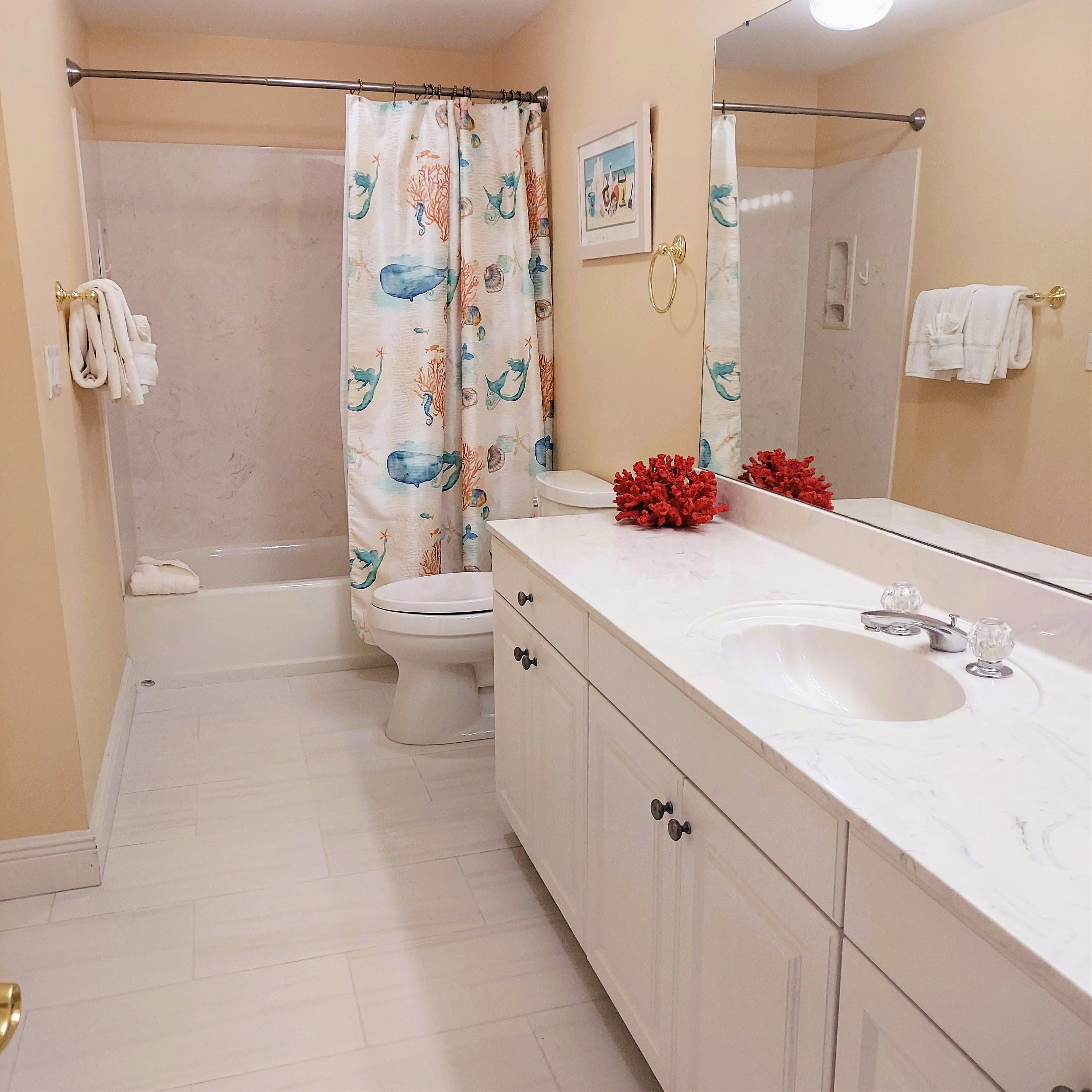 Double Queen Bath With Private and Hall Entry