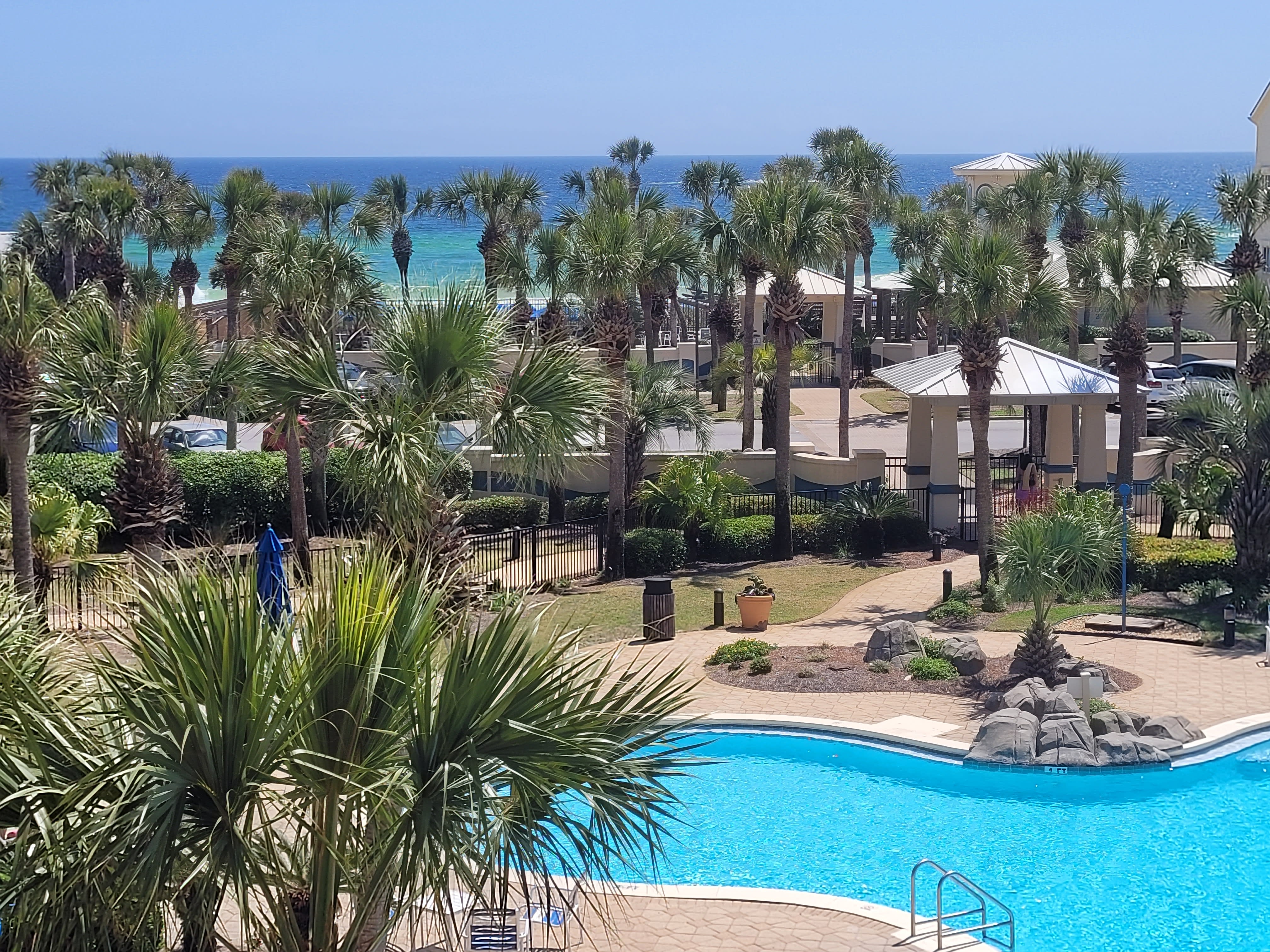 Great gulf view with free form pool and tropical landscaping. 