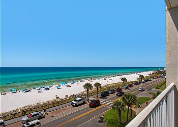 Full Views of the White Sandy Beach and Emerald Waters from the Balcony