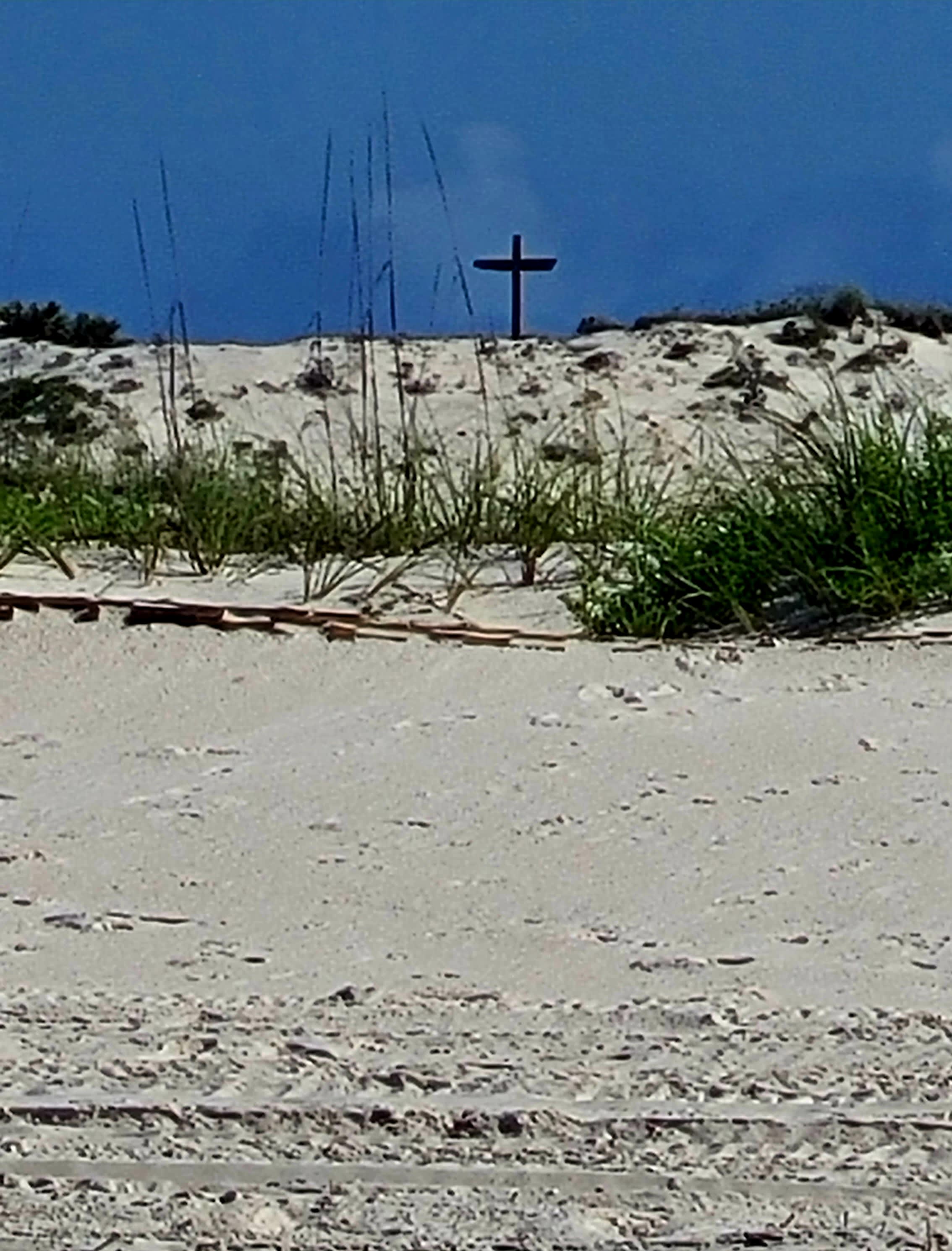Walk west on Fort Morgan Beach, cross in background. Beautiful