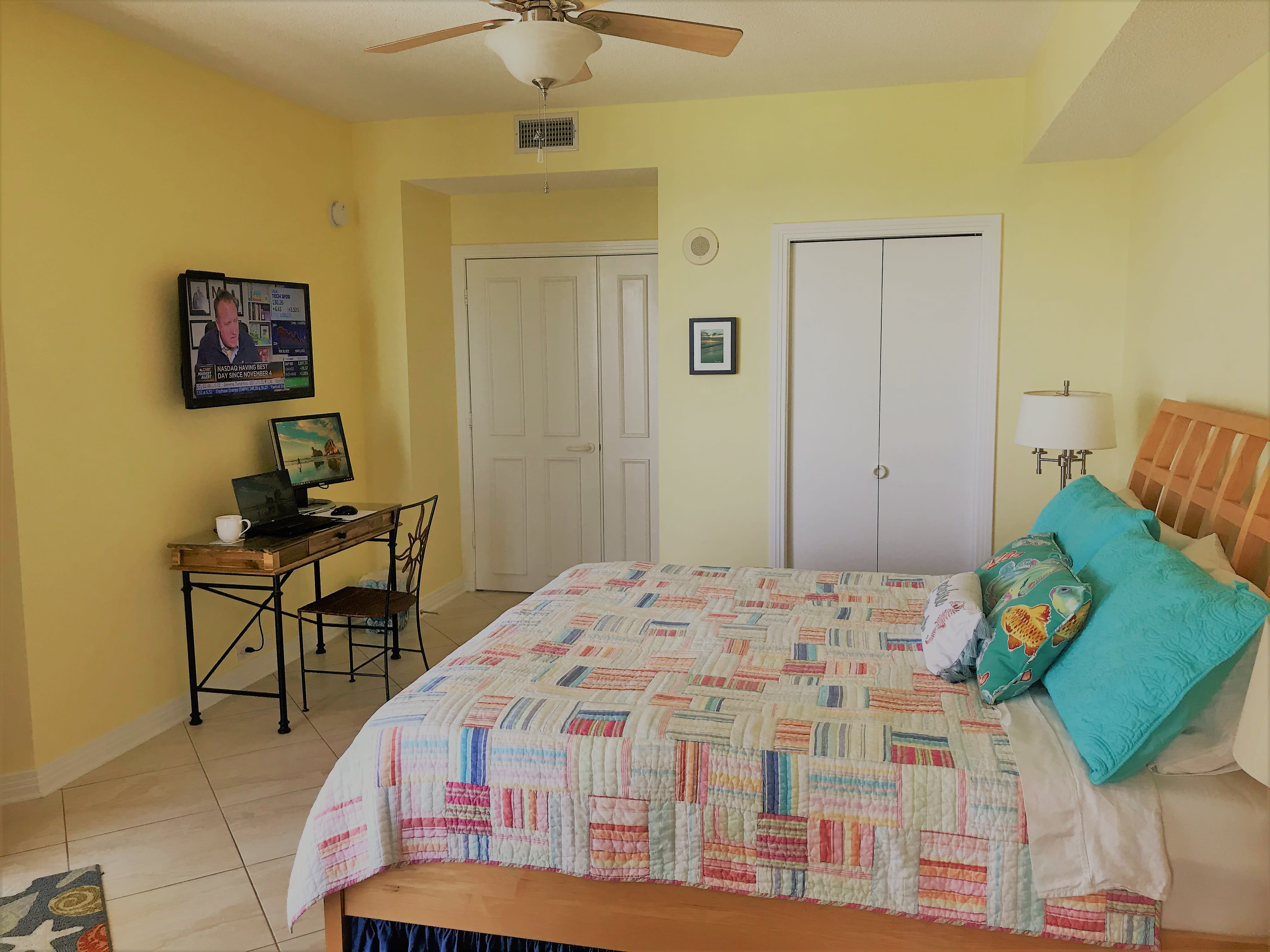 Master bedroom with 39 inch tv, giant bath, walk-in closet, desk &amp; great views