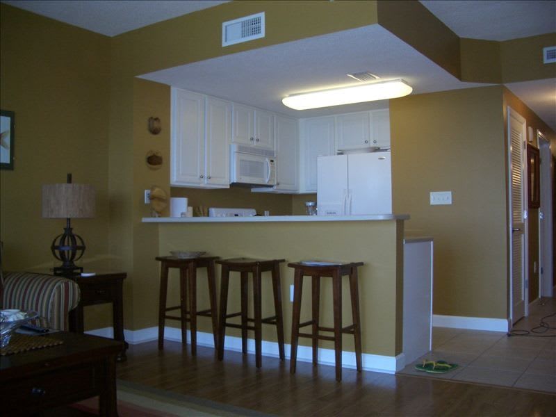 breakfast bar looking into the kitchen