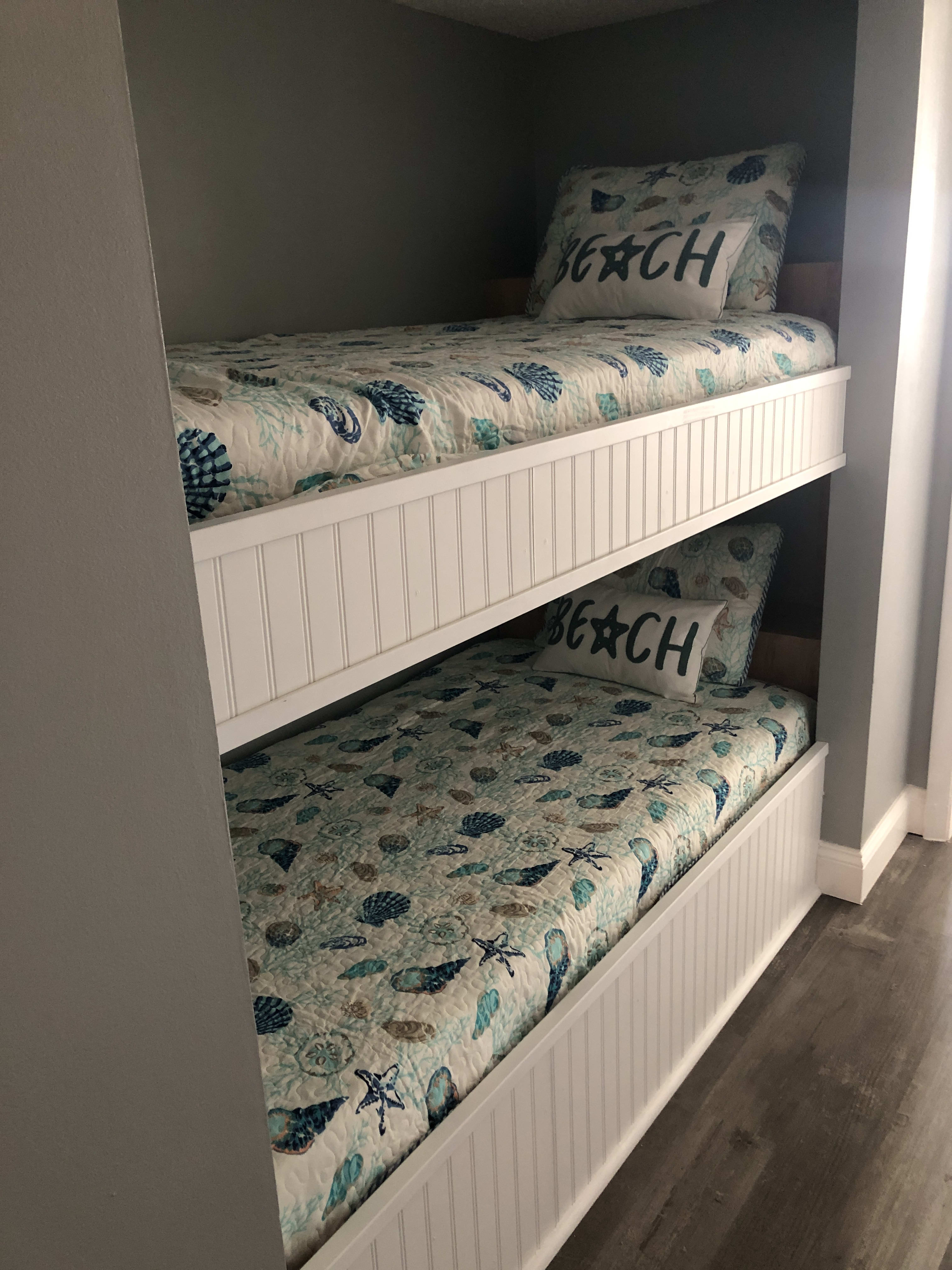 Bunk Beds located in hallway.