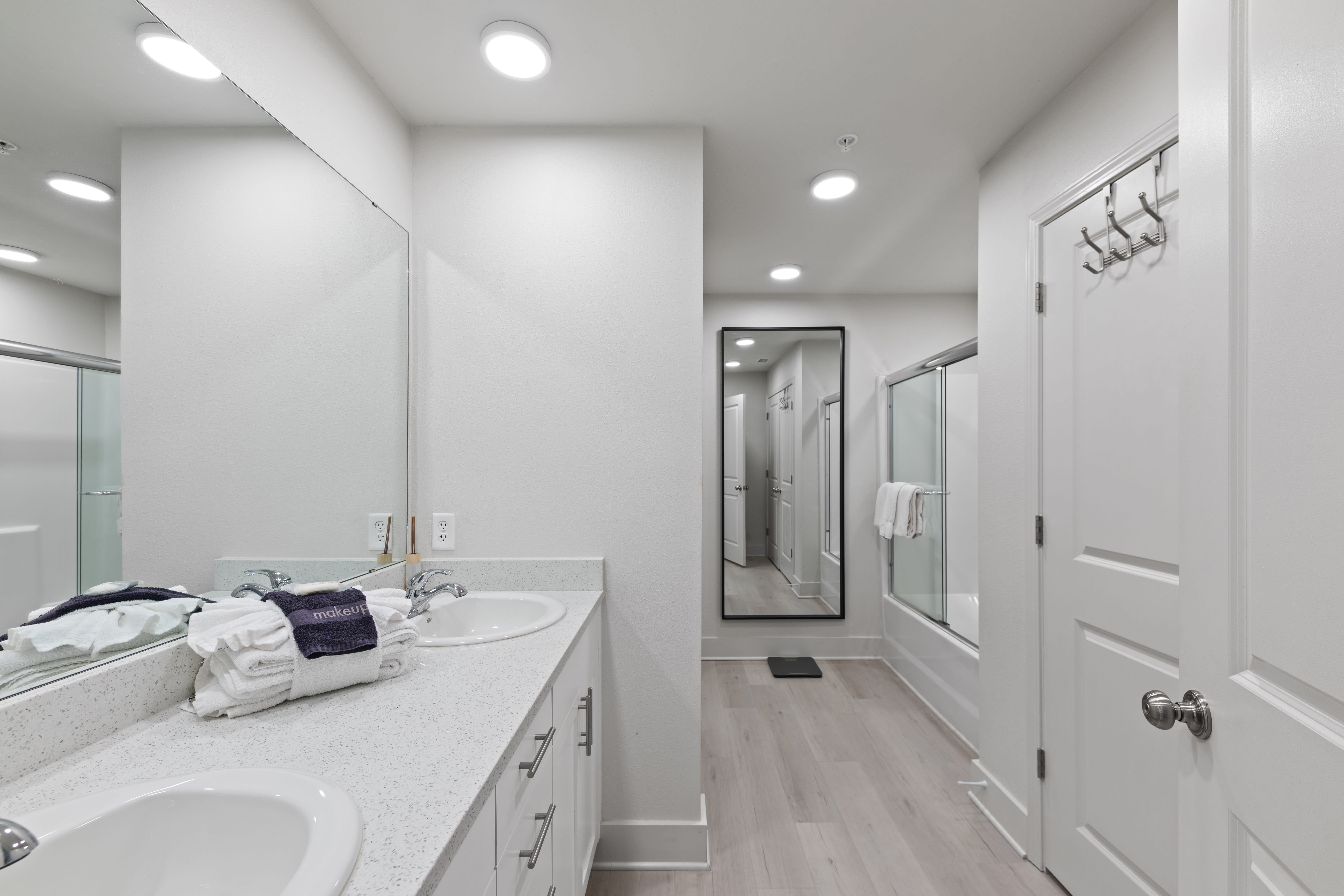 Master bathroom with tub and shower