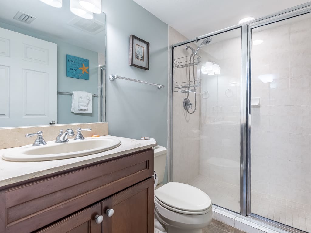 Hall bathroom next to front king bedroom and across from bunk room.