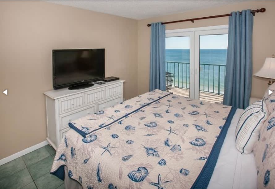 Master bedroom with balcony access 