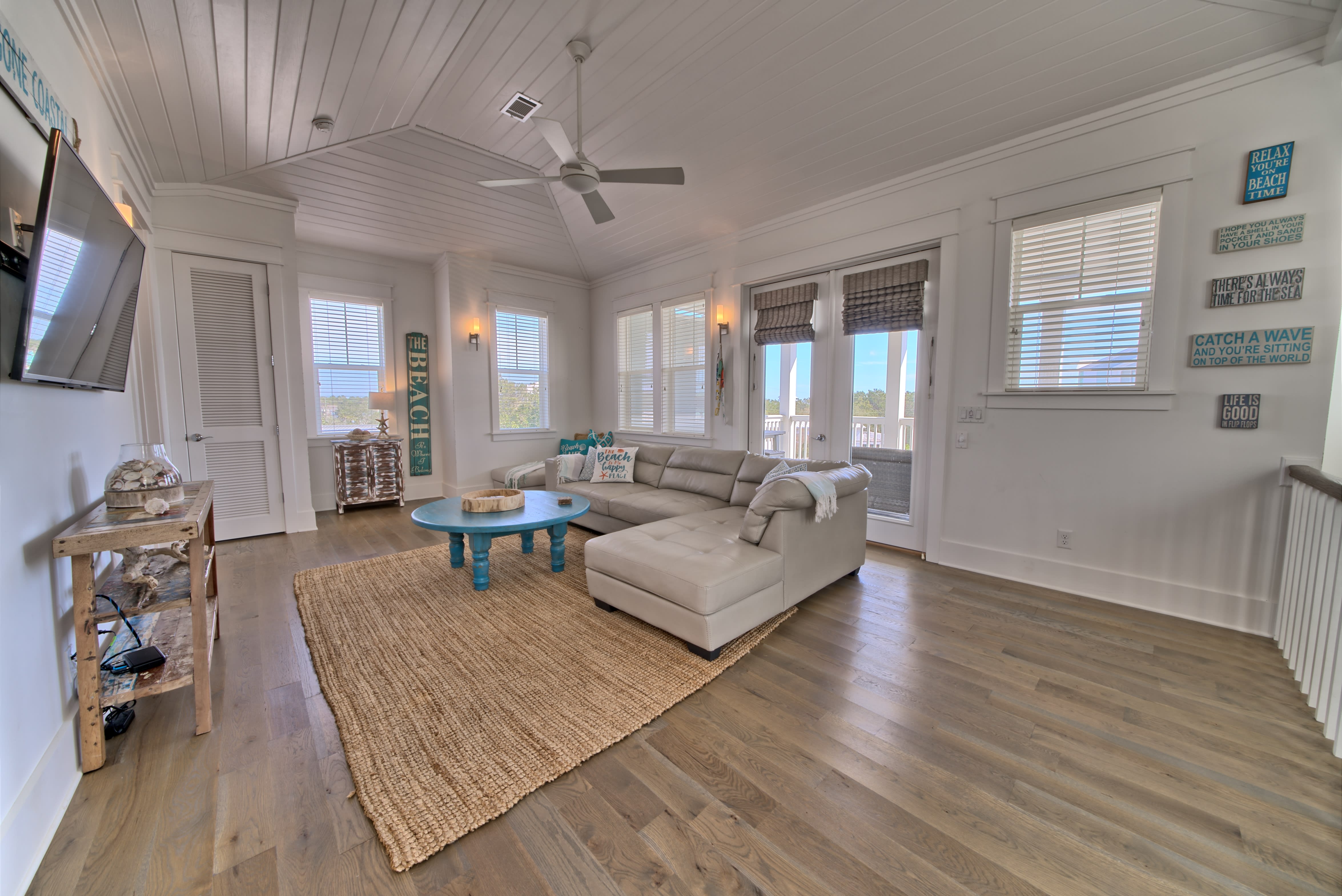3RD FLOOR LIVING SPACE W/ BALCONY THAT OPENS TO SUMMER KITCHEN