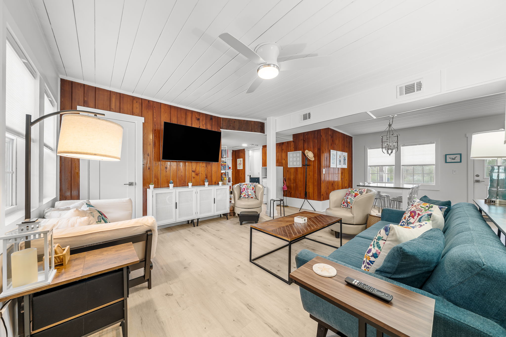 View from front door to den and dining area