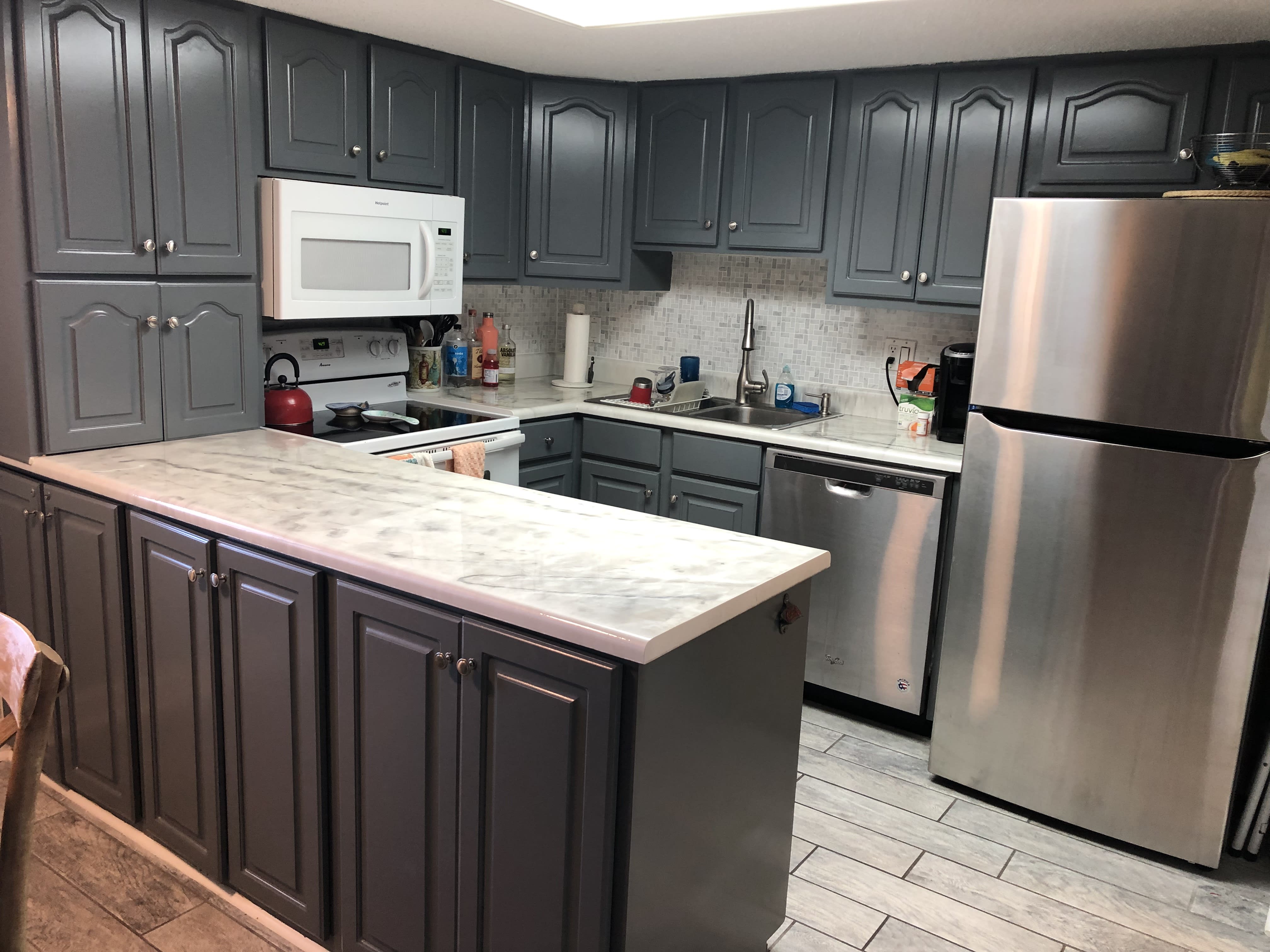 Kitchen cabinets were repainted in April of 2022