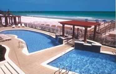 Two Beautiful pools overlooking the Gulf of Mexico--one is heated,  and a Hot Tub.