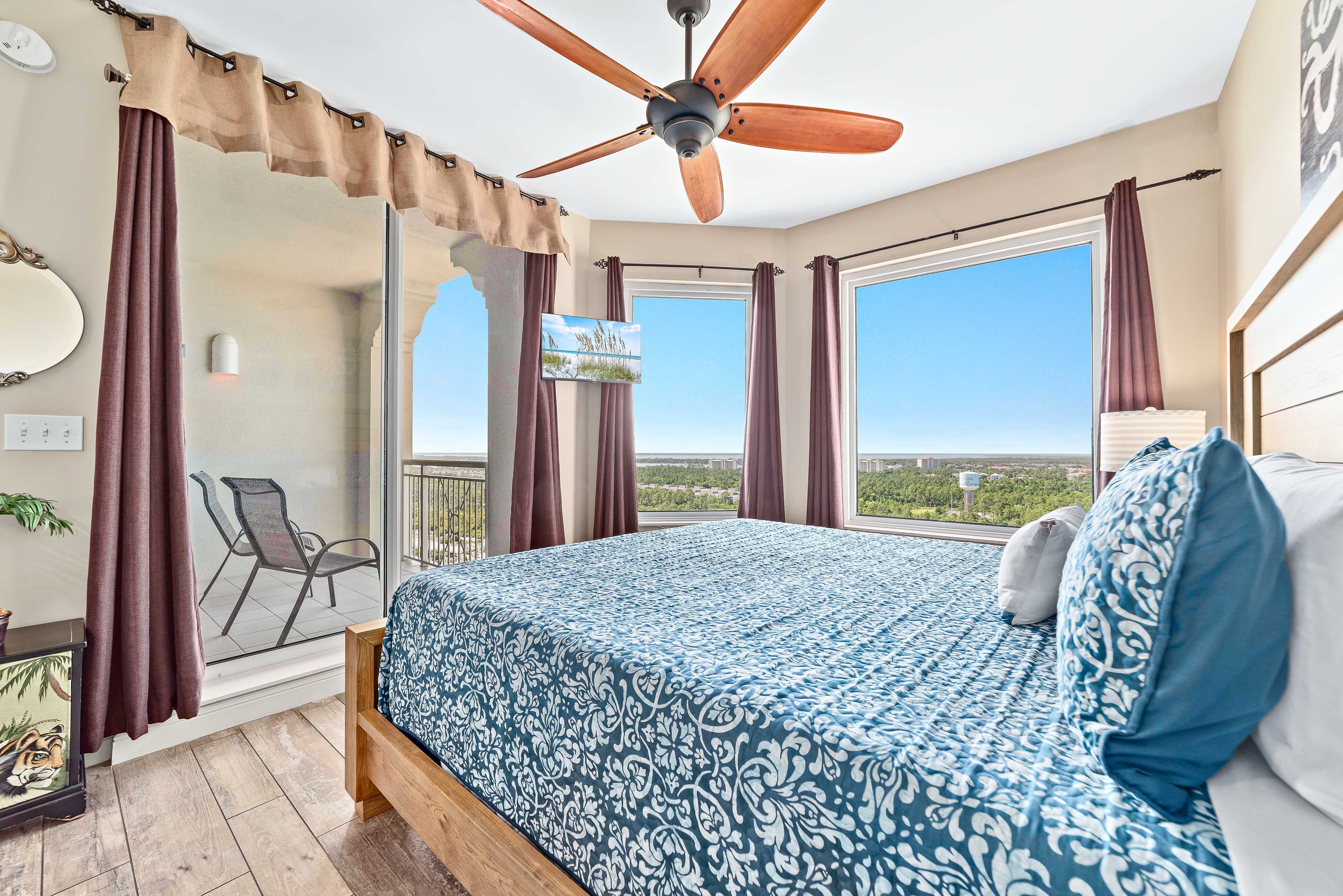New King size bed in our guest room, with views of the back bays and golf course