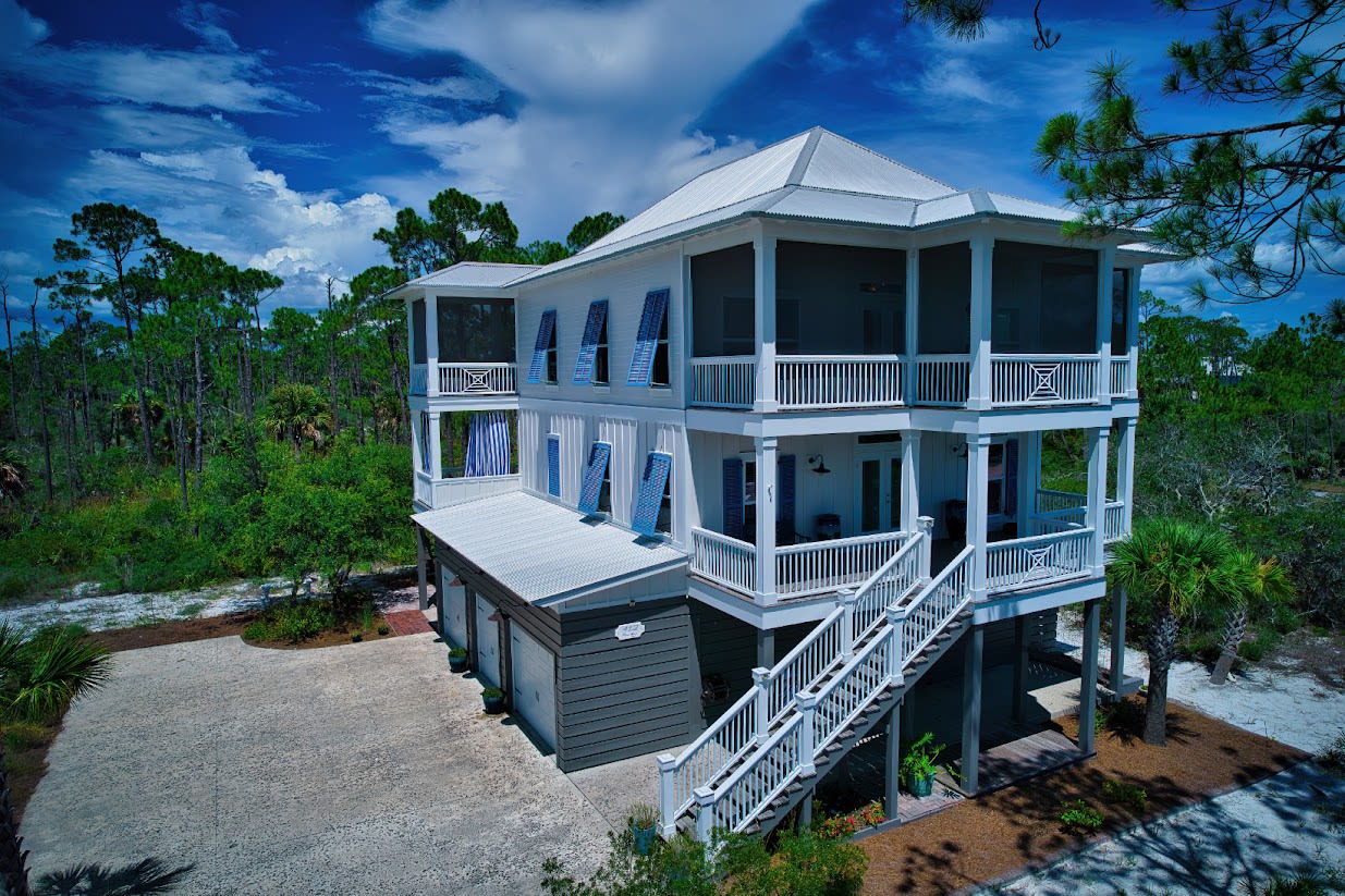 This shows the front of the house.  (The campfire area is in the back.)