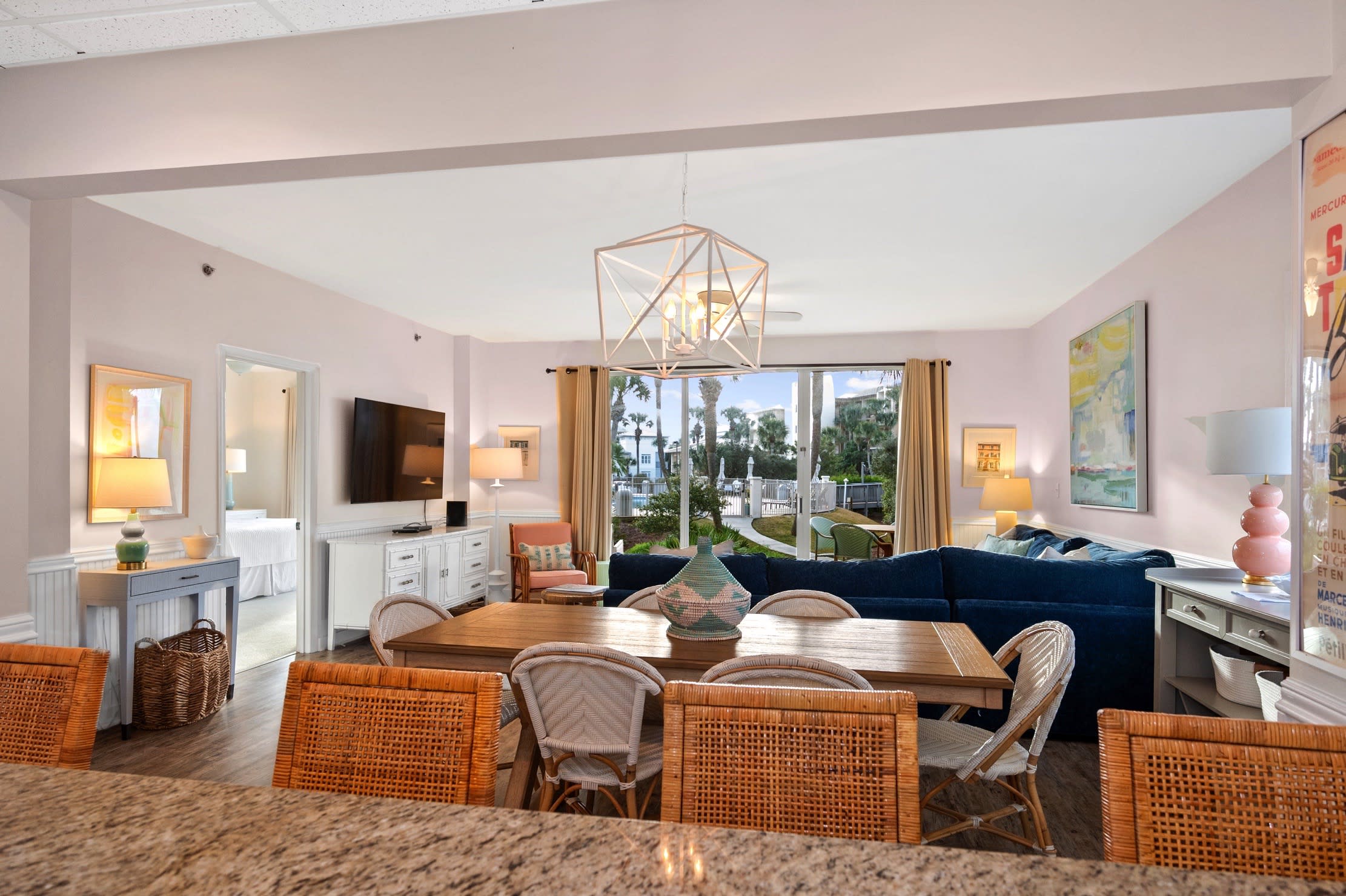 Kitchen looks out to pool area.