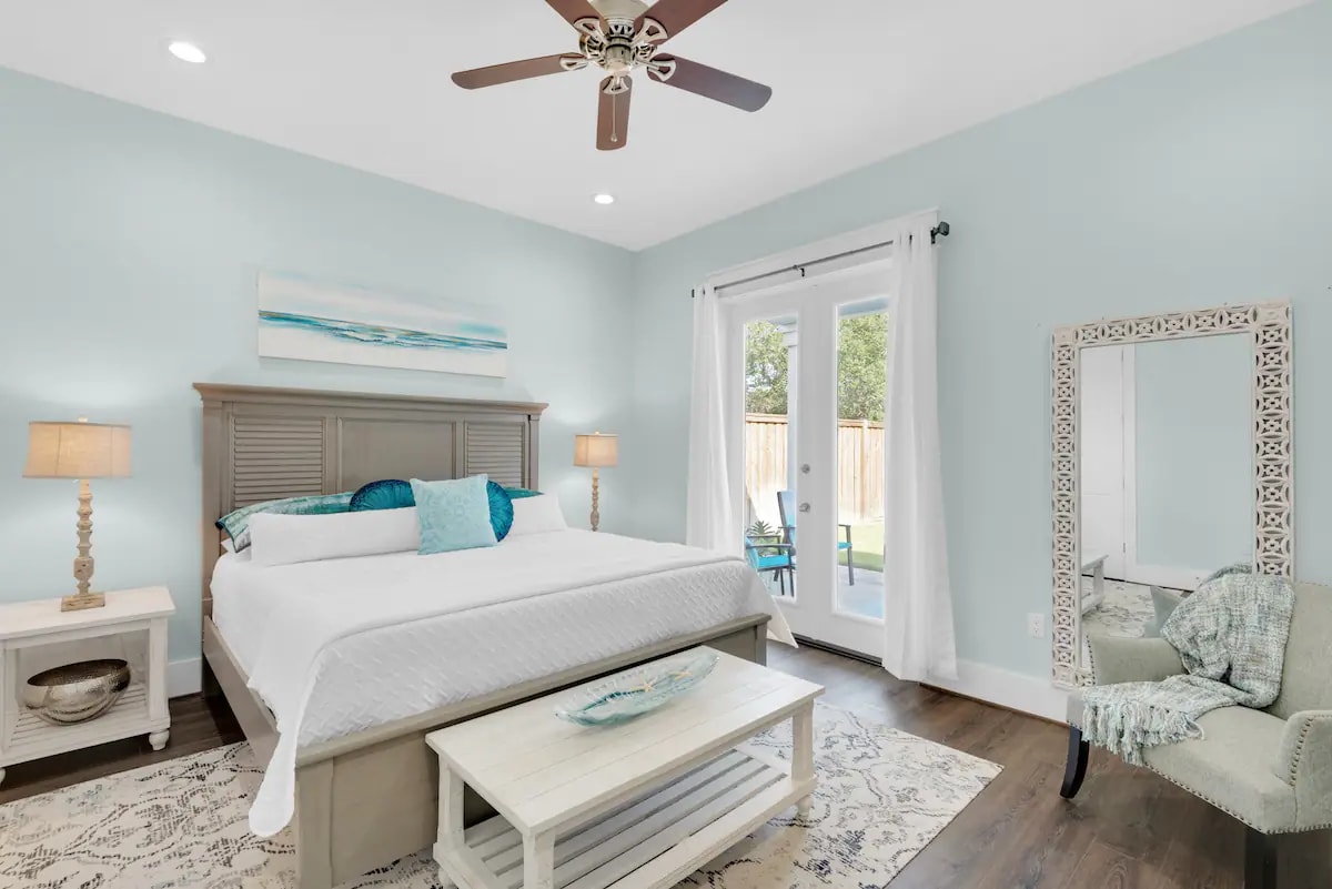 Breeze-13 Bed 1 - Photo 1 - 1st Floor king suite with private bath, private pool entrance, and wall-mounted flat screen tv.