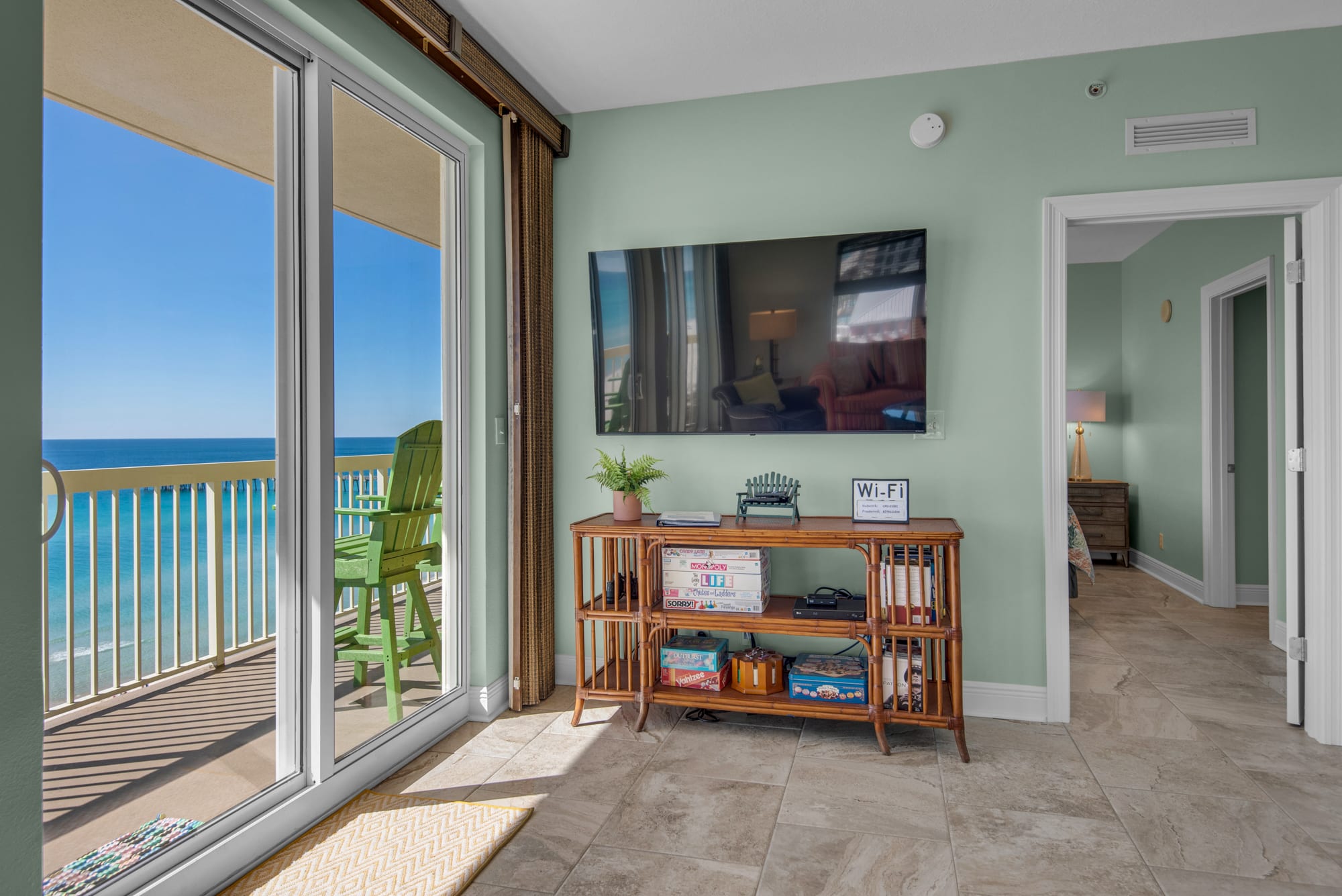 65" Wall mounted TV with games, books &amp; movies provided.