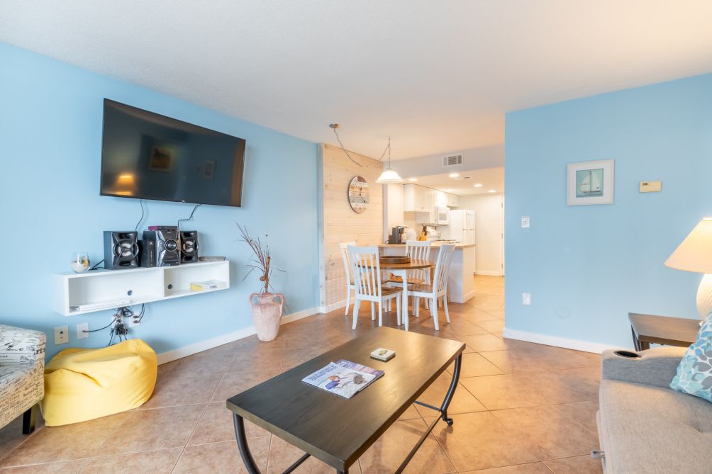 Living Area View facing Dining and Kitchen Area