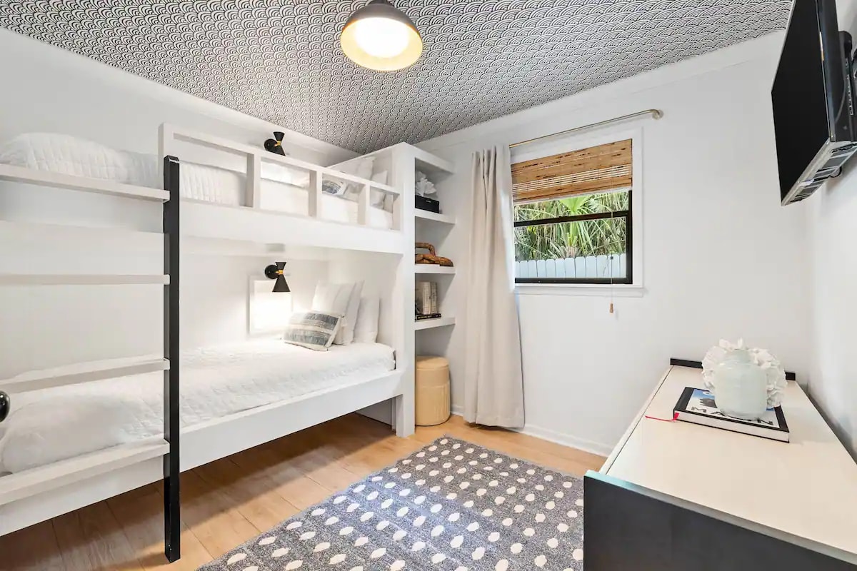 Bunk room with twin over twin and tv 