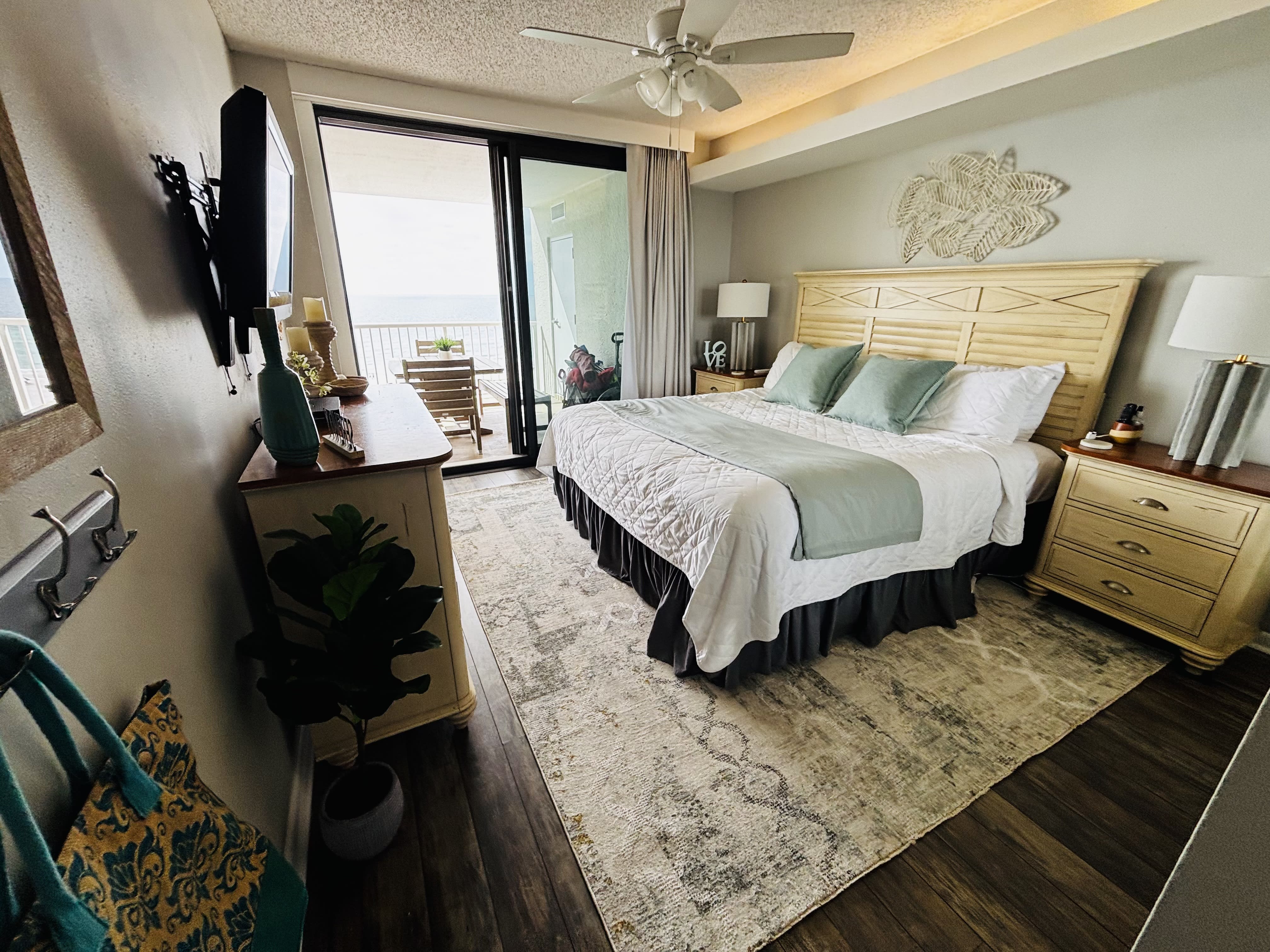 Primary bedroom has a cozy vibe with an ensuite bath.