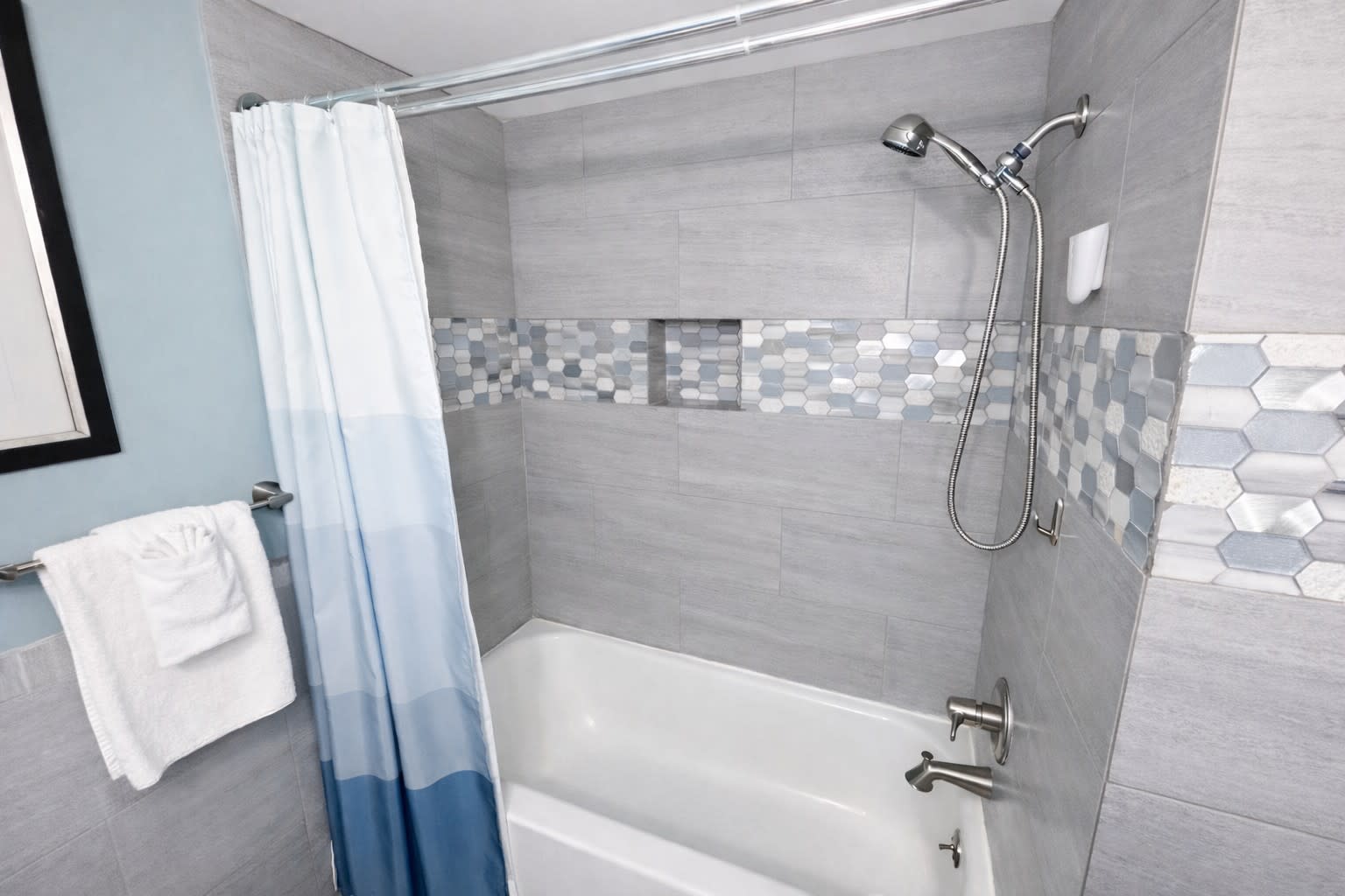 2nd bath - New tile with tub and built in niche.