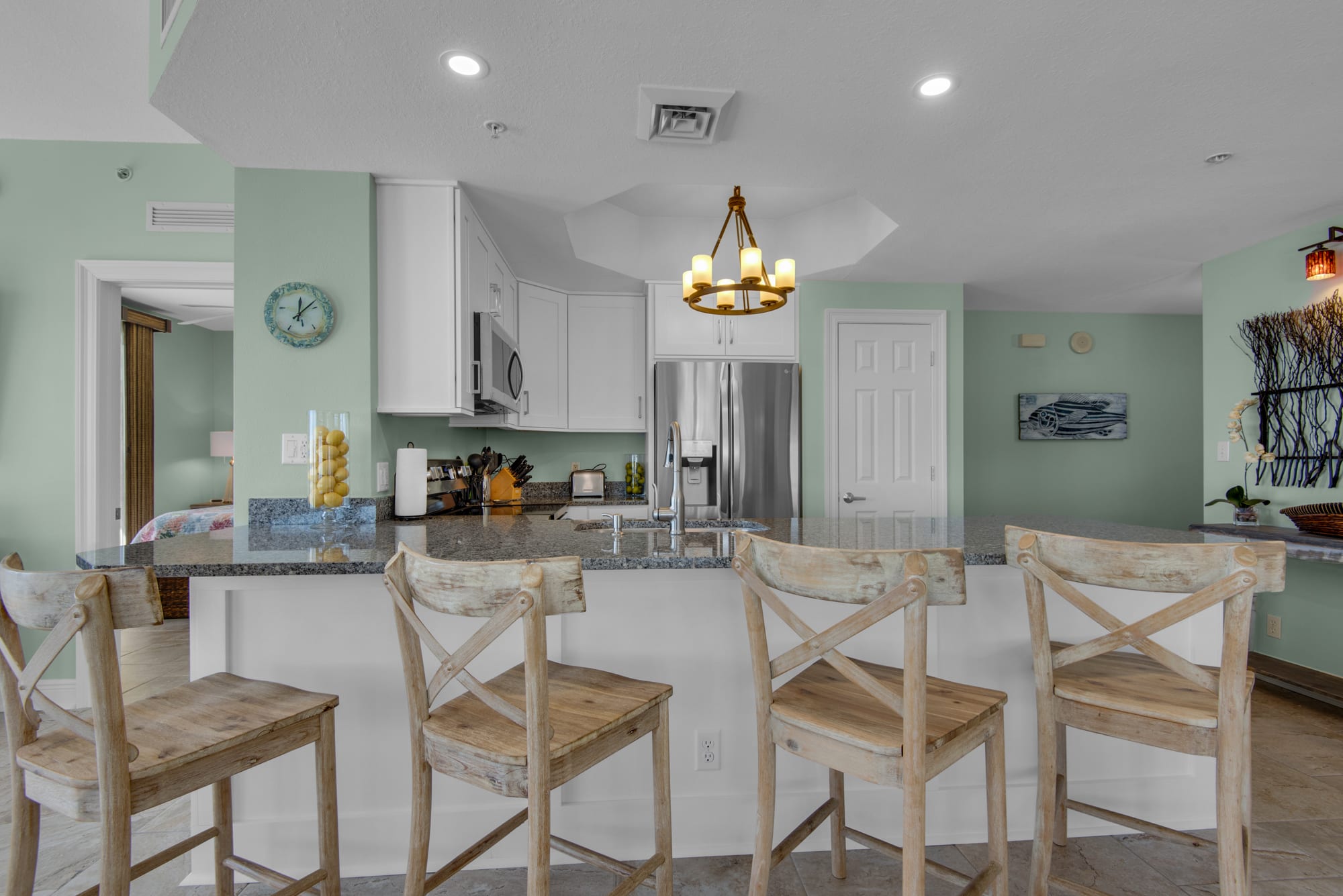 Kitchen has stainless steel appliances, pantry closet &amp; under cabinet lighting.