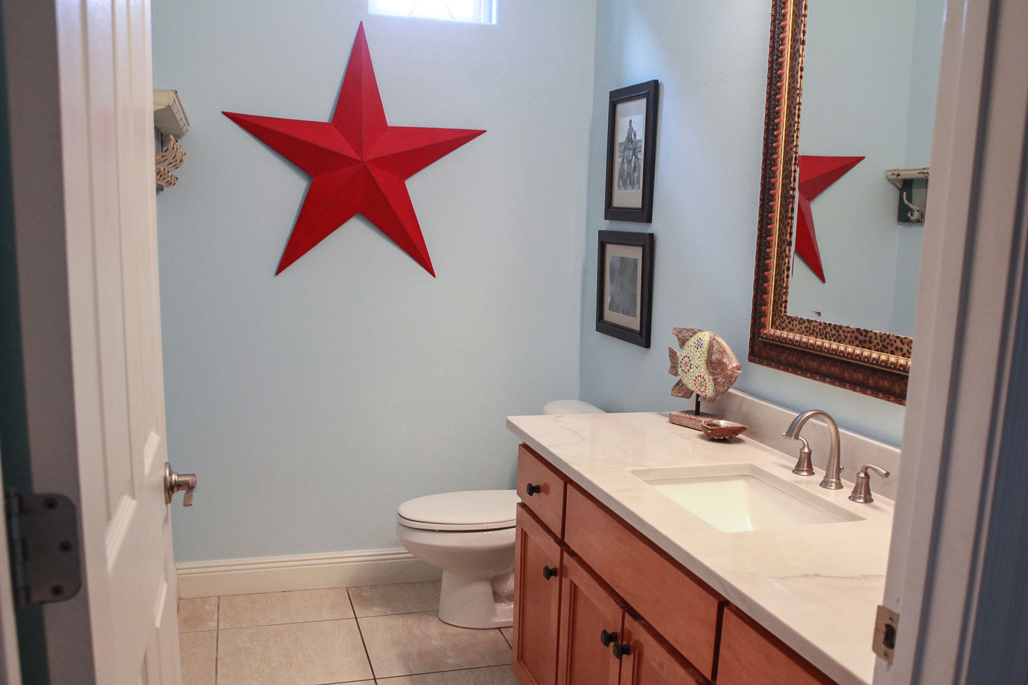 Full size bath on main level with new quartz countertop