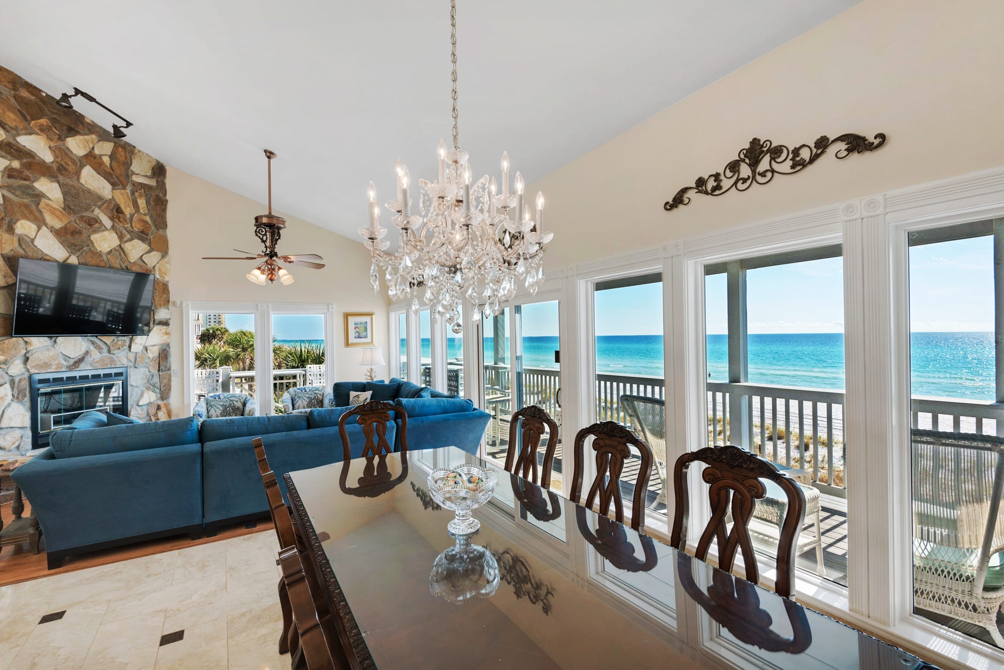 View of dining room into living room, showing spectacular views of he ocean