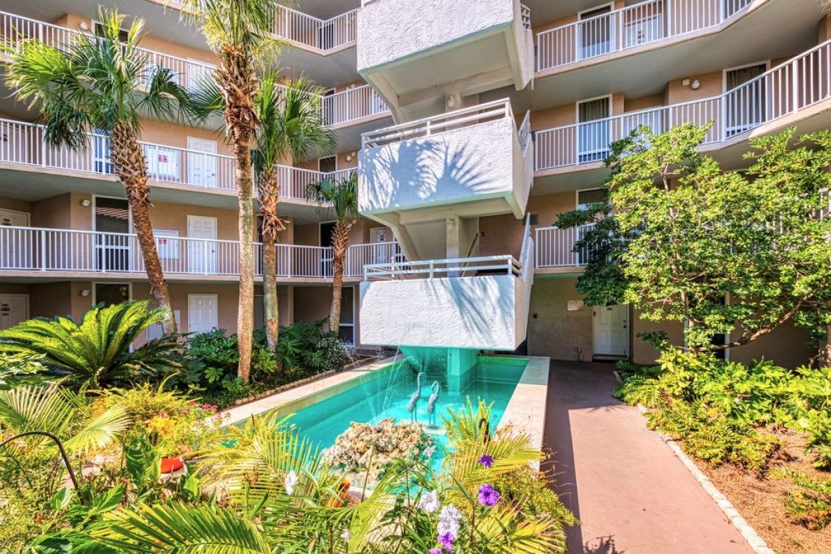 Common area is beautiful with a tropical feel