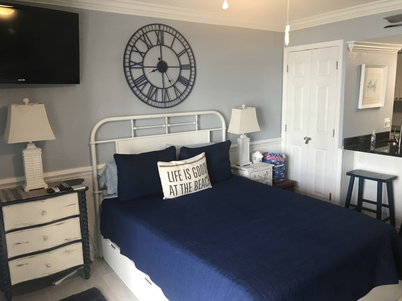Comfortable Queen bed with drawers underneath; TV to watch from the couch.