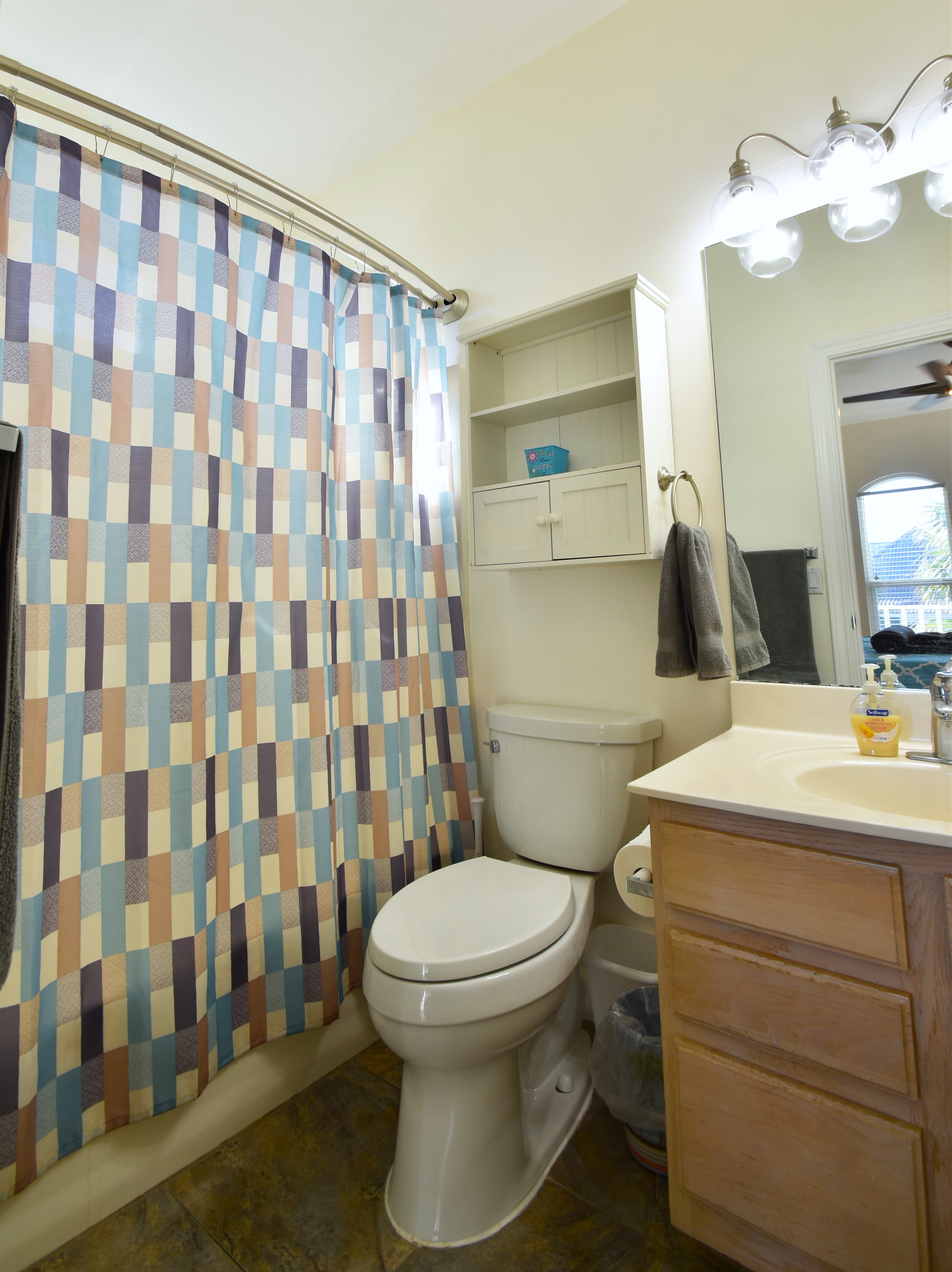 Attached master bath with tub and shower