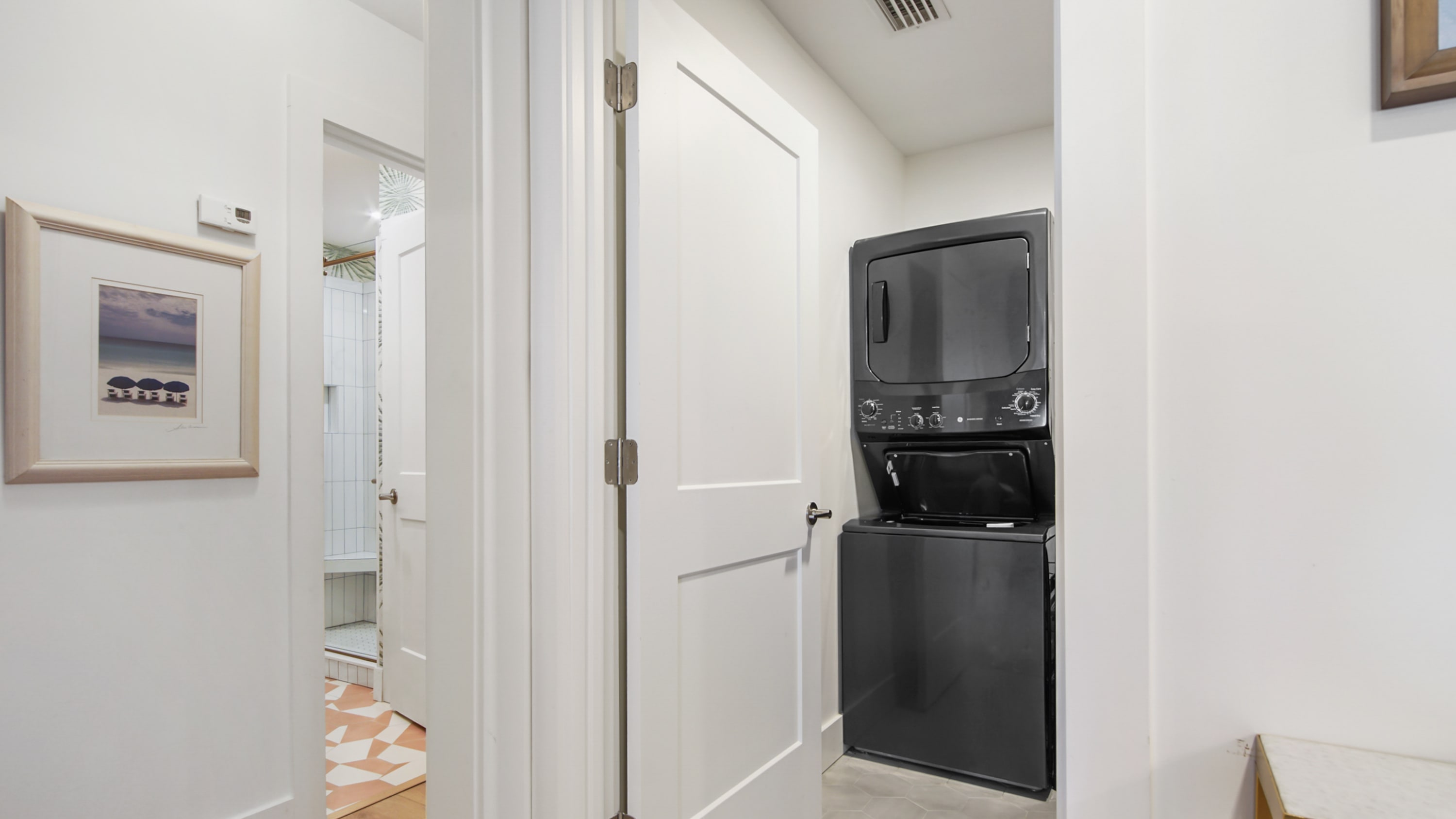 Laundry room with extra full size refrigerator