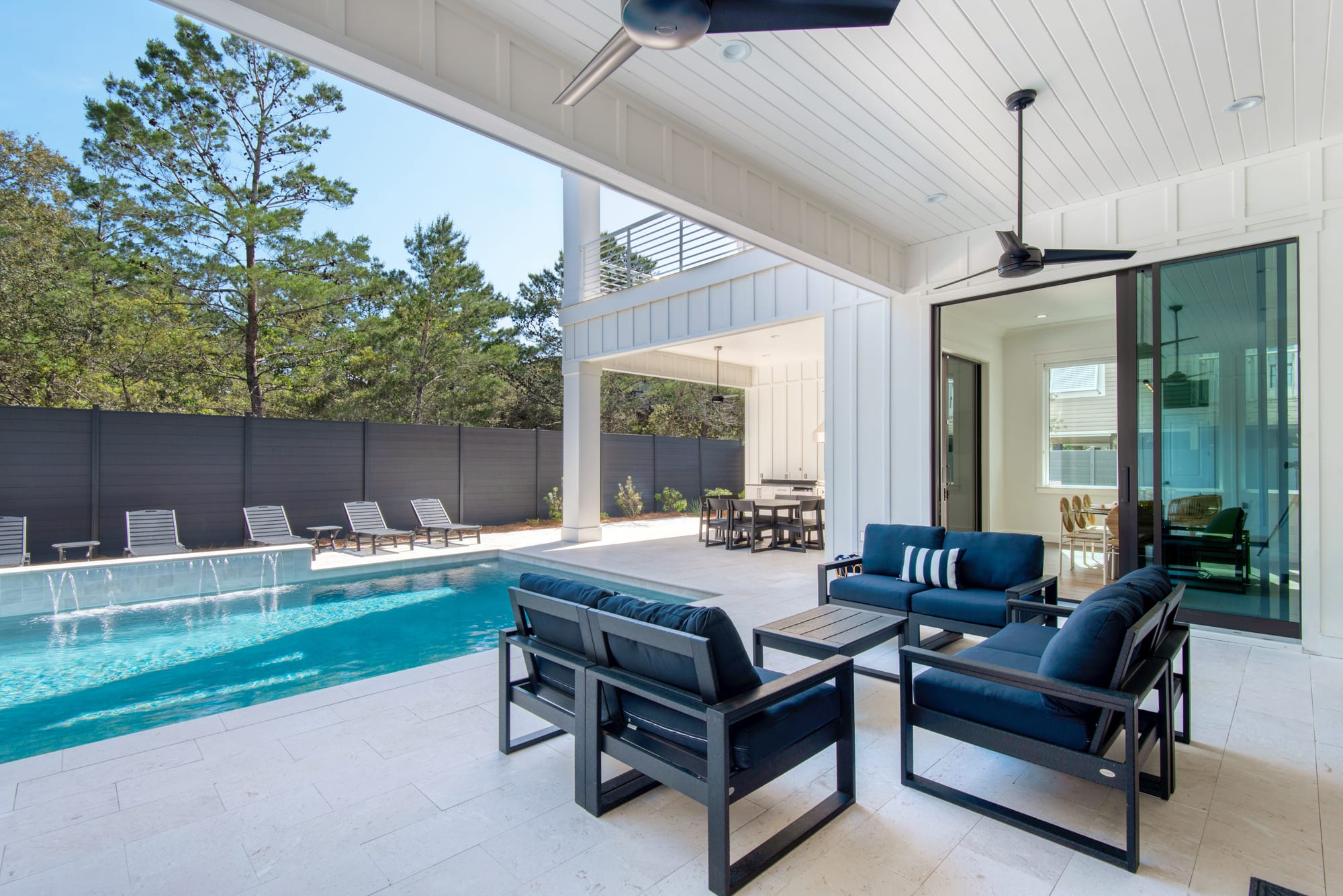  7ft x 7ft hot tub. The heated pool with tanning shelf on the pool and umbrella