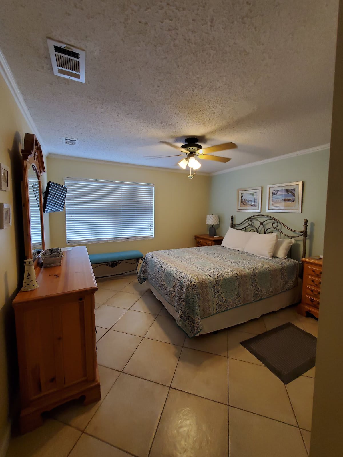 Master bedroom with queen bed and private ensuite.
