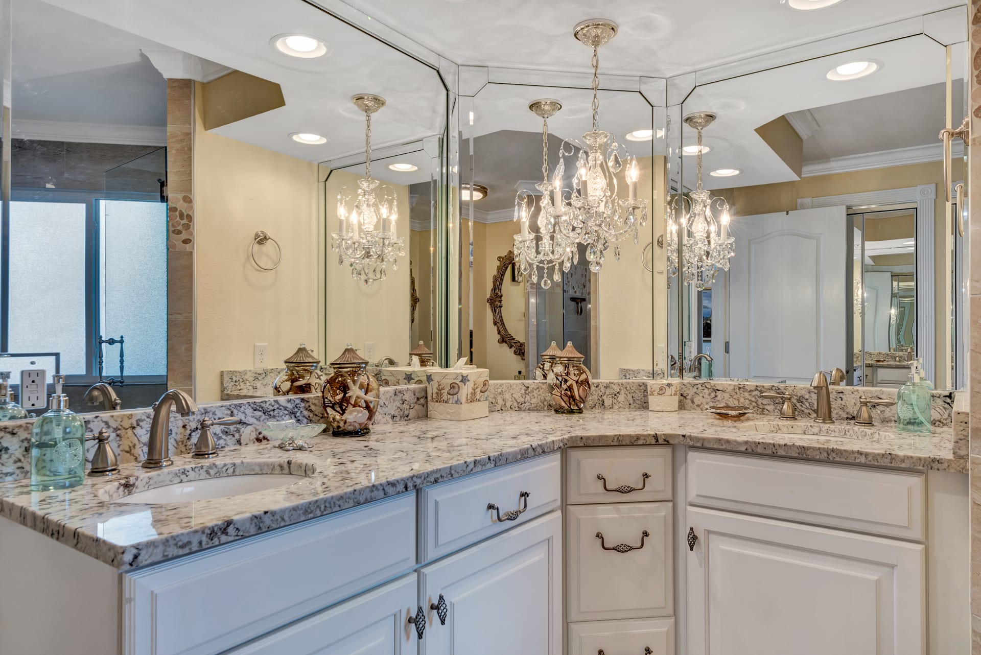 Master Bathroom with Granite Countertops and Wall of Mirrors