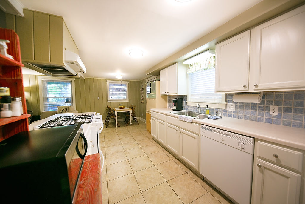 Kitchen with gas stove, pantry, and all needed utensils and cookware