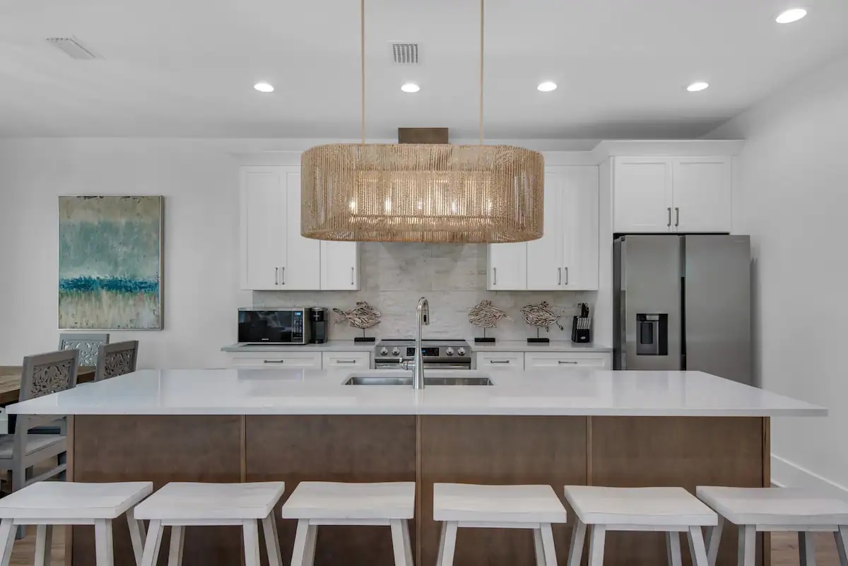 Driftwood-8  features a beautiful quartz island for grab-and-go meals, making beach outings effortless for your family!