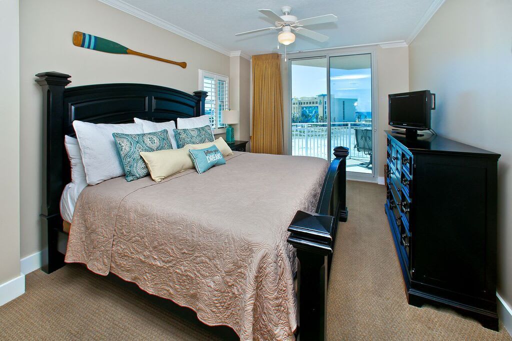 One of 2 king size master bedrooms. New bedding 2016. Opens to the large balcony